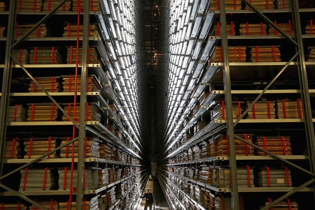 Resident engineer John Roberts poses as he looks at the millions of newspapers stored on racks at the National Newspaper Archive in Boston Spa. The British Library's brand new National Newspaper Building has officially opened. The newly built storage void