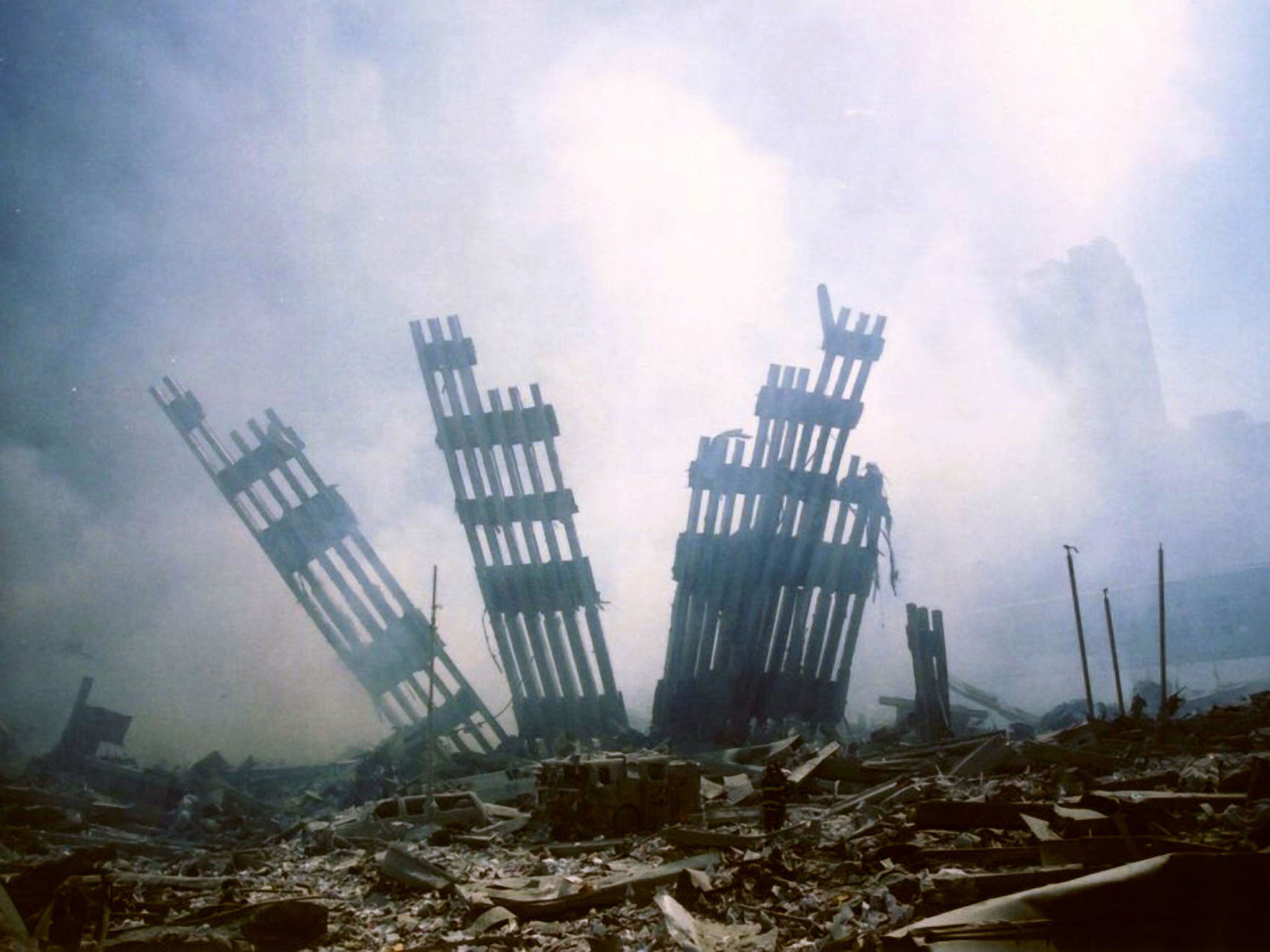 The remains of the World Trade Center stands amid the debris following the terrorist attack on the building in New York
