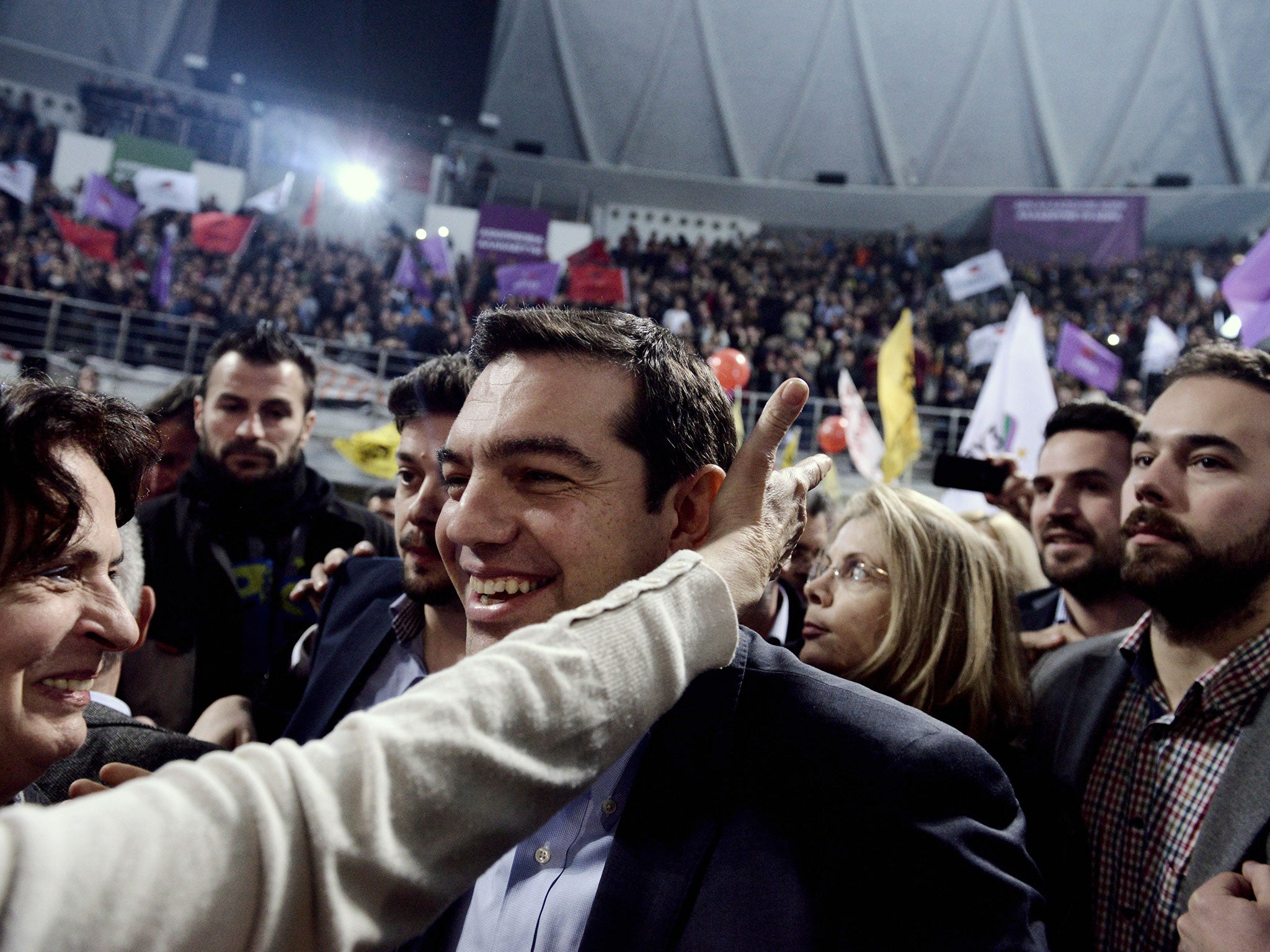 Alexis Tsipras, head of Greece's Syriza main opposition party arrives for a pre-election campaign speech.