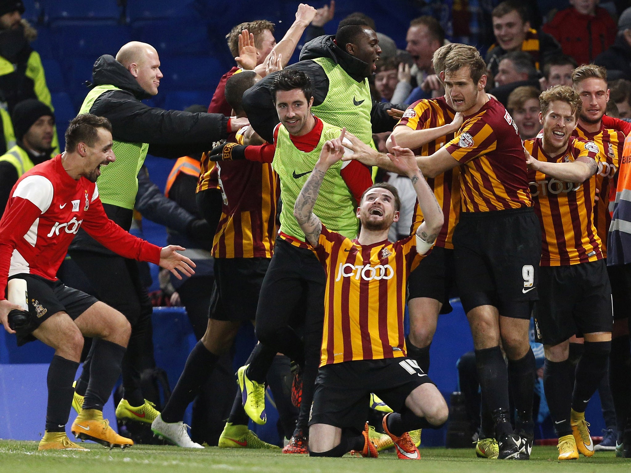 Bradford City players celebrate at Stamford Bridge