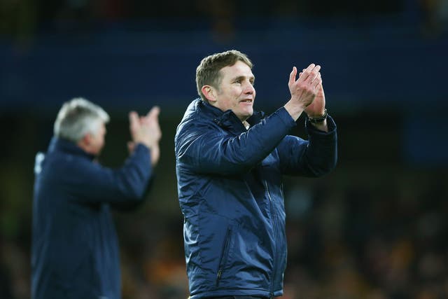 Manager Phil Parkinson applauds the Bradford support