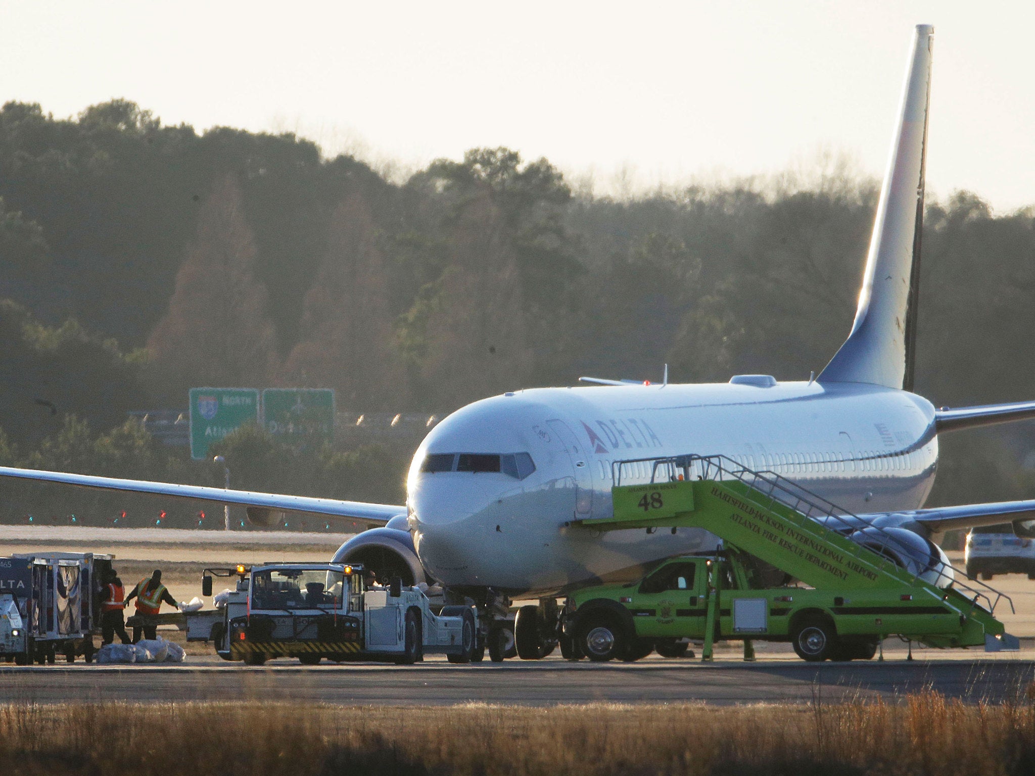 The Delta Airlines aircraft sitting on the tarmac after being escorted by fighter jets owing to a bomb threat (AP)