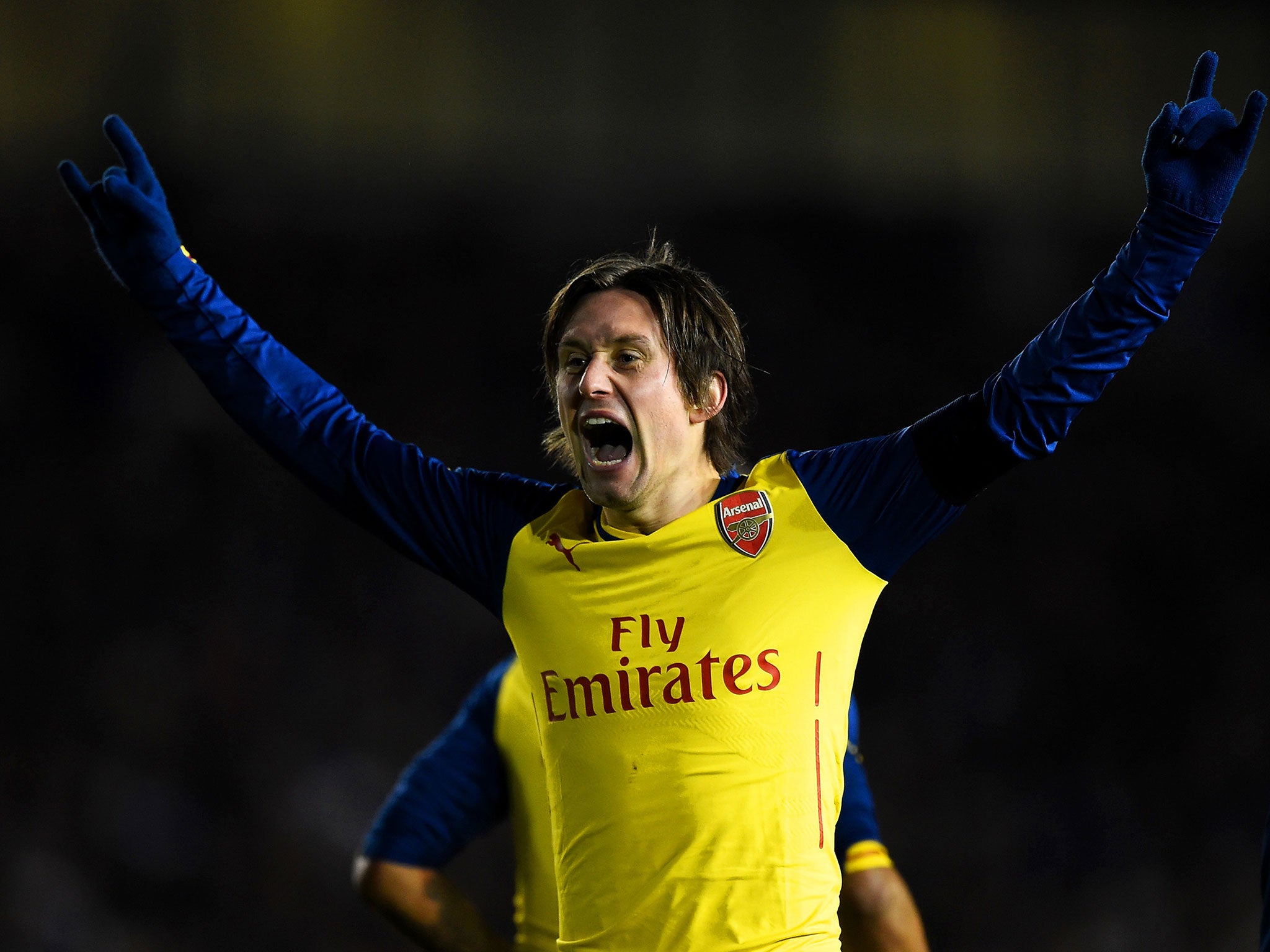 Tomas Rosicky celebrates scoring Arsenal's third