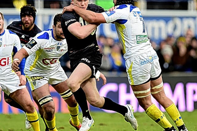Owen Farrell, of Saracens, who later went off with a leg injury, is tackled by Clermont’s Julien Bardy at Stade Marcel Michelin