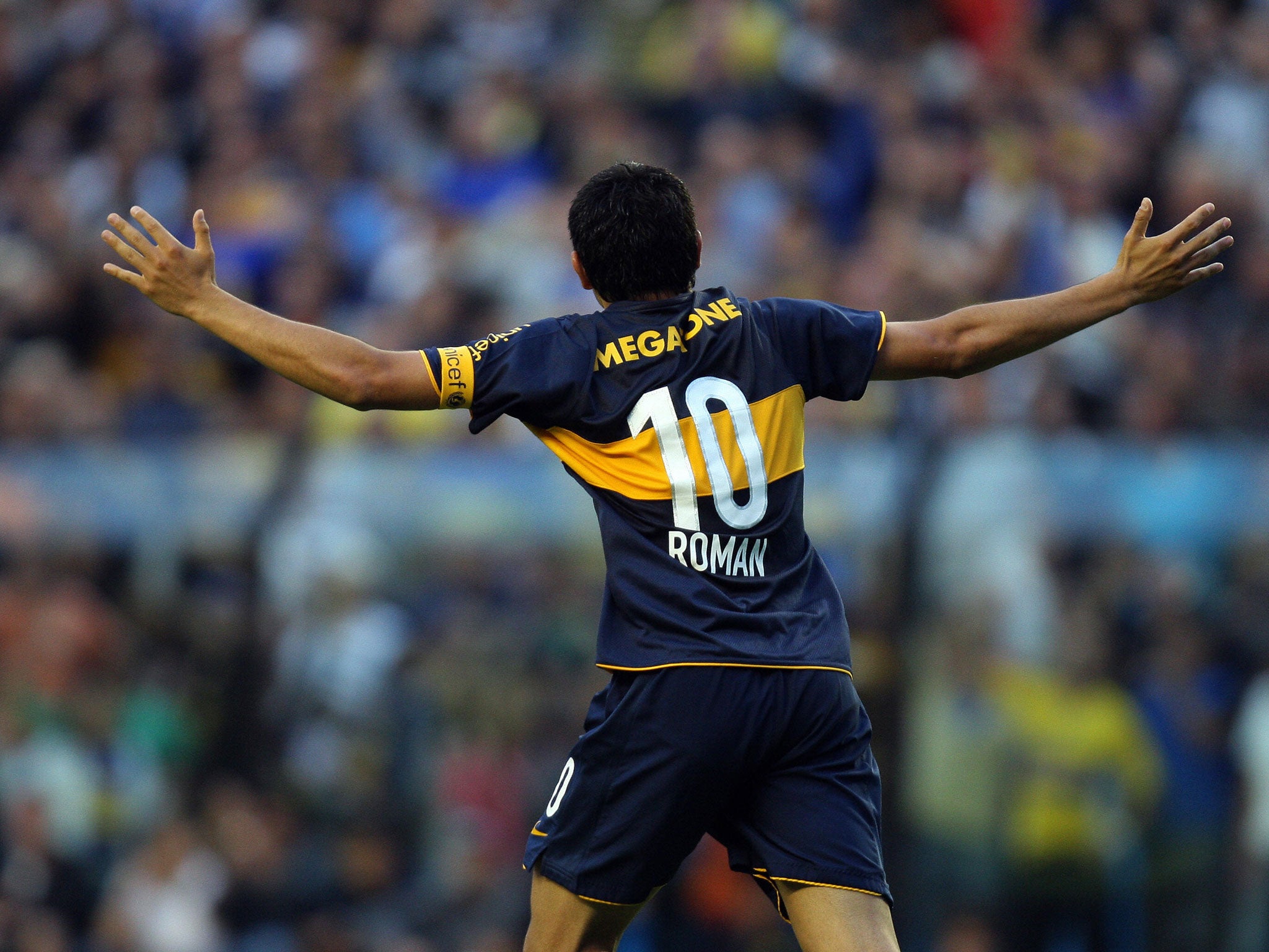 Male Professional Soccer Player Wearing A Brazil Yellow National Team Jersey  With The Number Ten On The Back Entering The Stadium Full Of Fans For A  Match. Stock Photo, Picture and Royalty