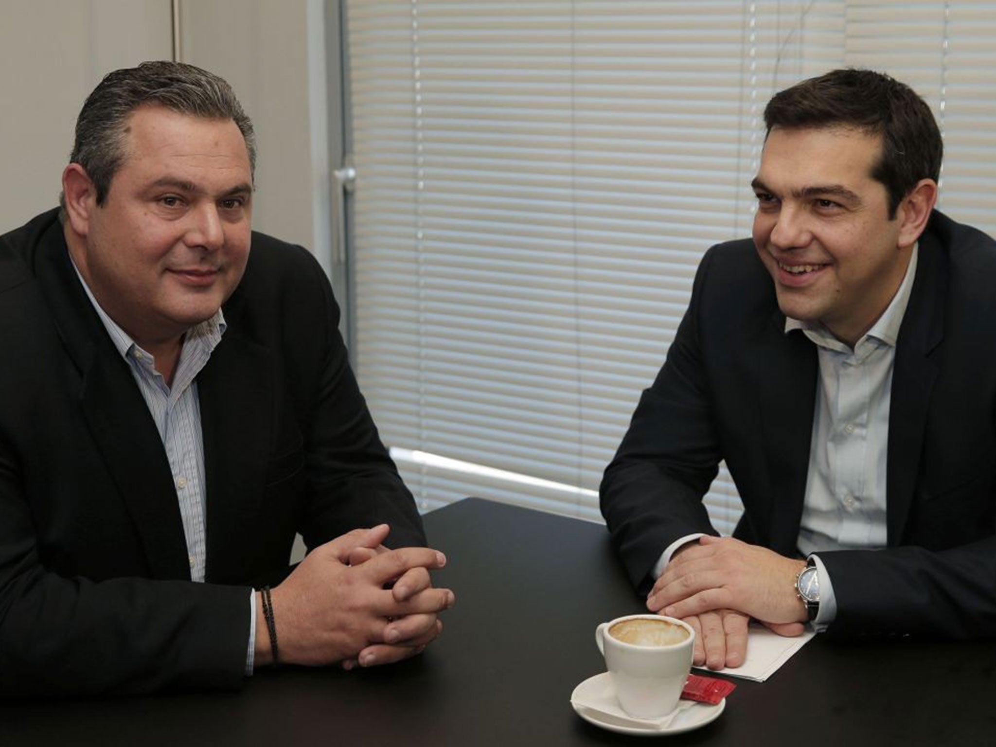 Alexis Tsipras, right, leader of Greece's left-wing Syriza party, and Panos Kammenos, chairman of the right-wing Independent Greeks party