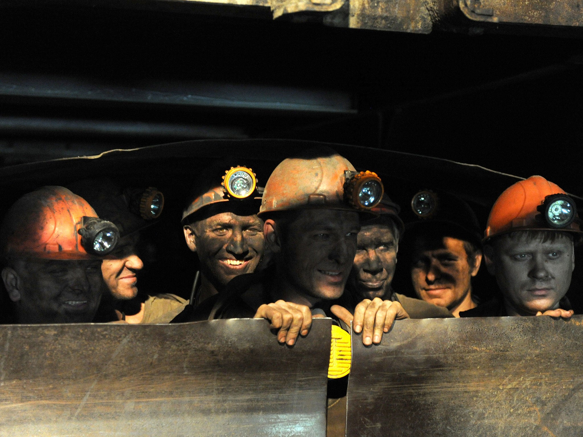Coal miners take an lift out of the Zasyadko mine in Donetsk in June 2014
