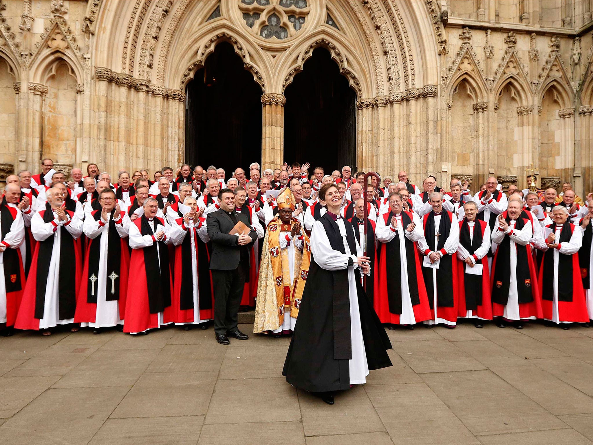 Libby Lane, the first female bishop in the Church of England, smiles following her consecration service at York Minster in York