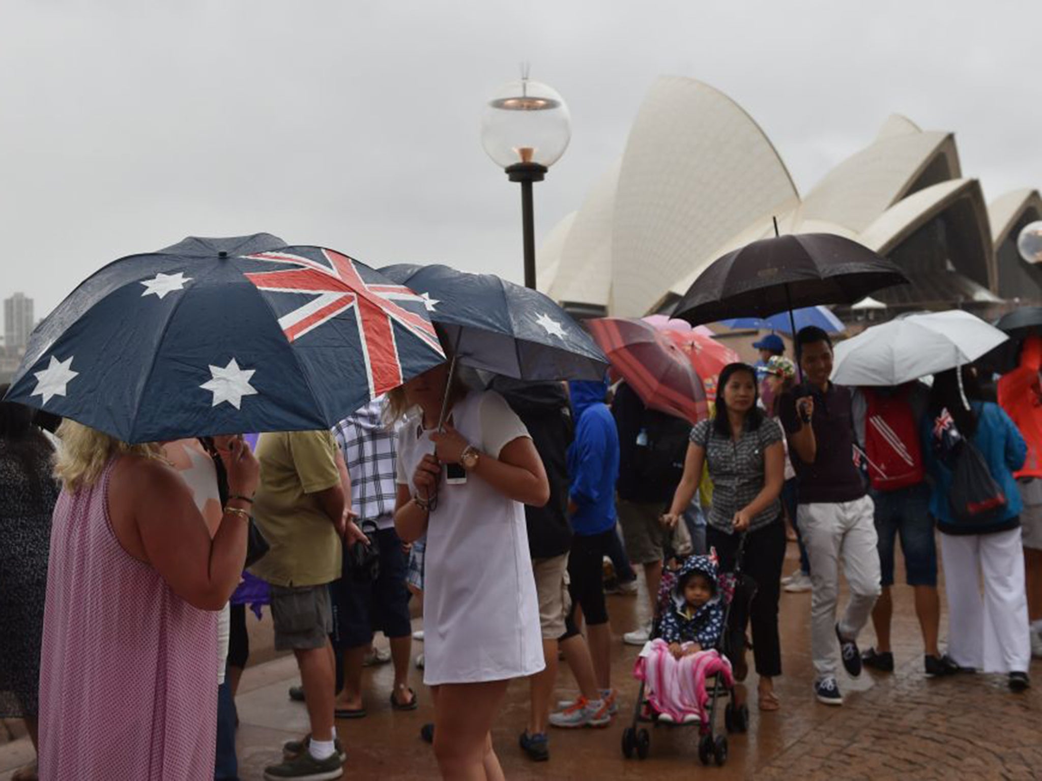 In spite of the rain, people in Sydney Harbour turned out to celebrate Australia Day