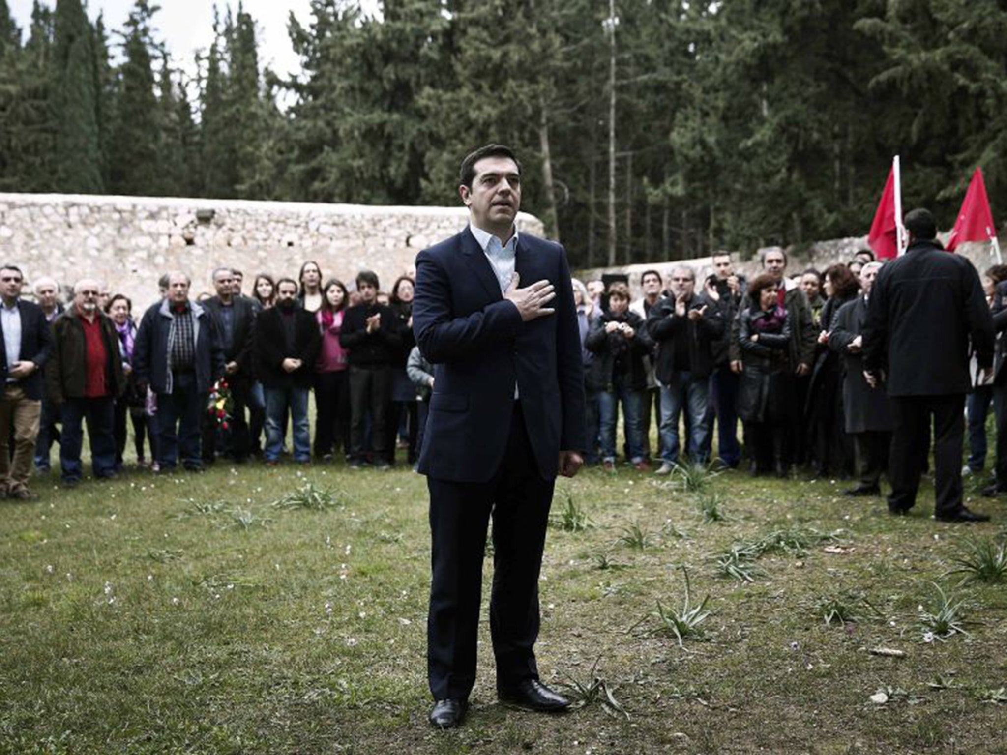 Greece’s newly appointed Prime Minister, Alexis Tsipras, at a ceremony in Athens yesterday, marking the execution of Greek resistance members by the Nazis during the Second World War (Reuters)