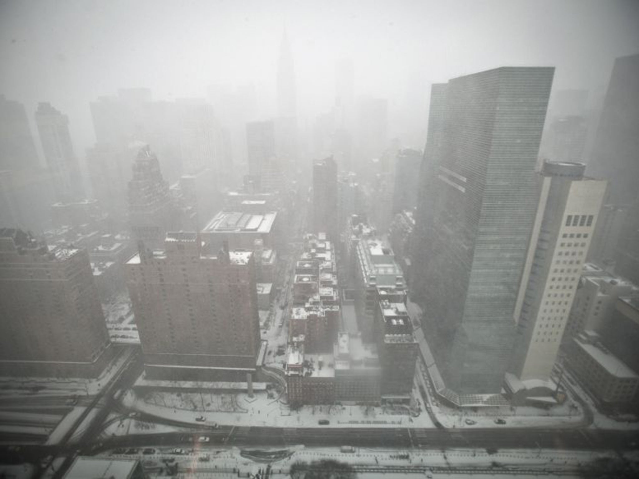 Mid-town Manhattan as pictured from the top of the United Nations building in New York; Juno has brought a blizzard warning for the city as well as much of the North East United States