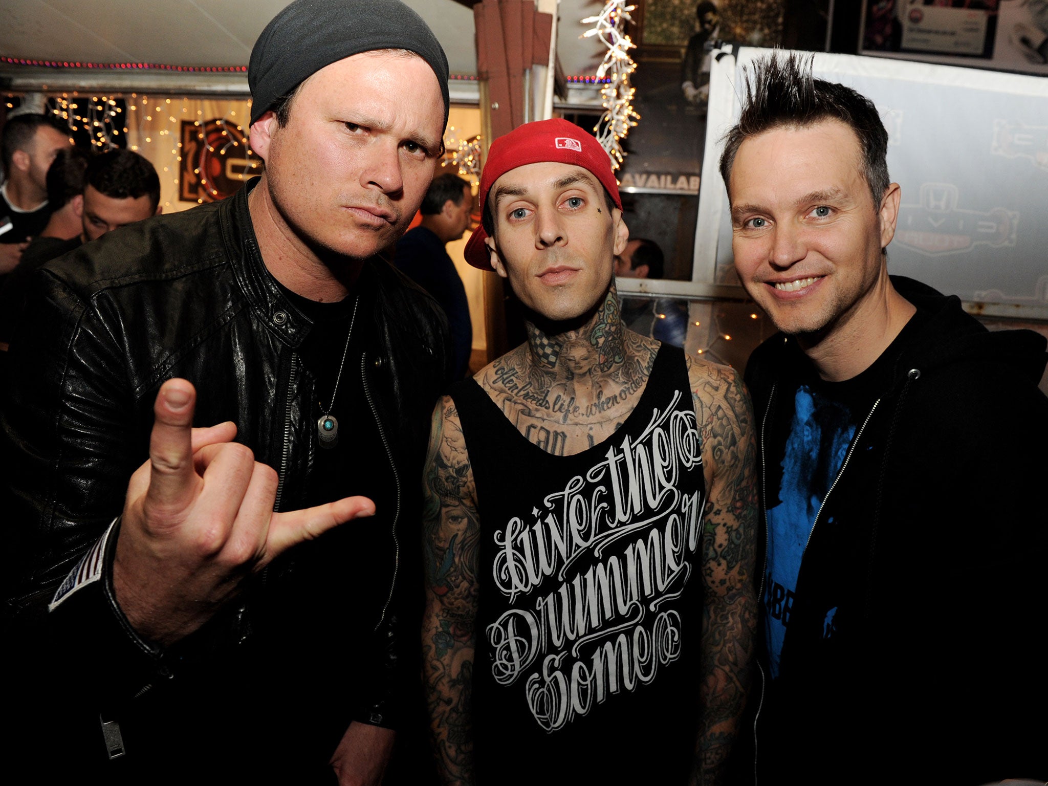 Tom DeLonge, Travis Barker and Mark Hoppus of Blink-182 pictured in 2011.