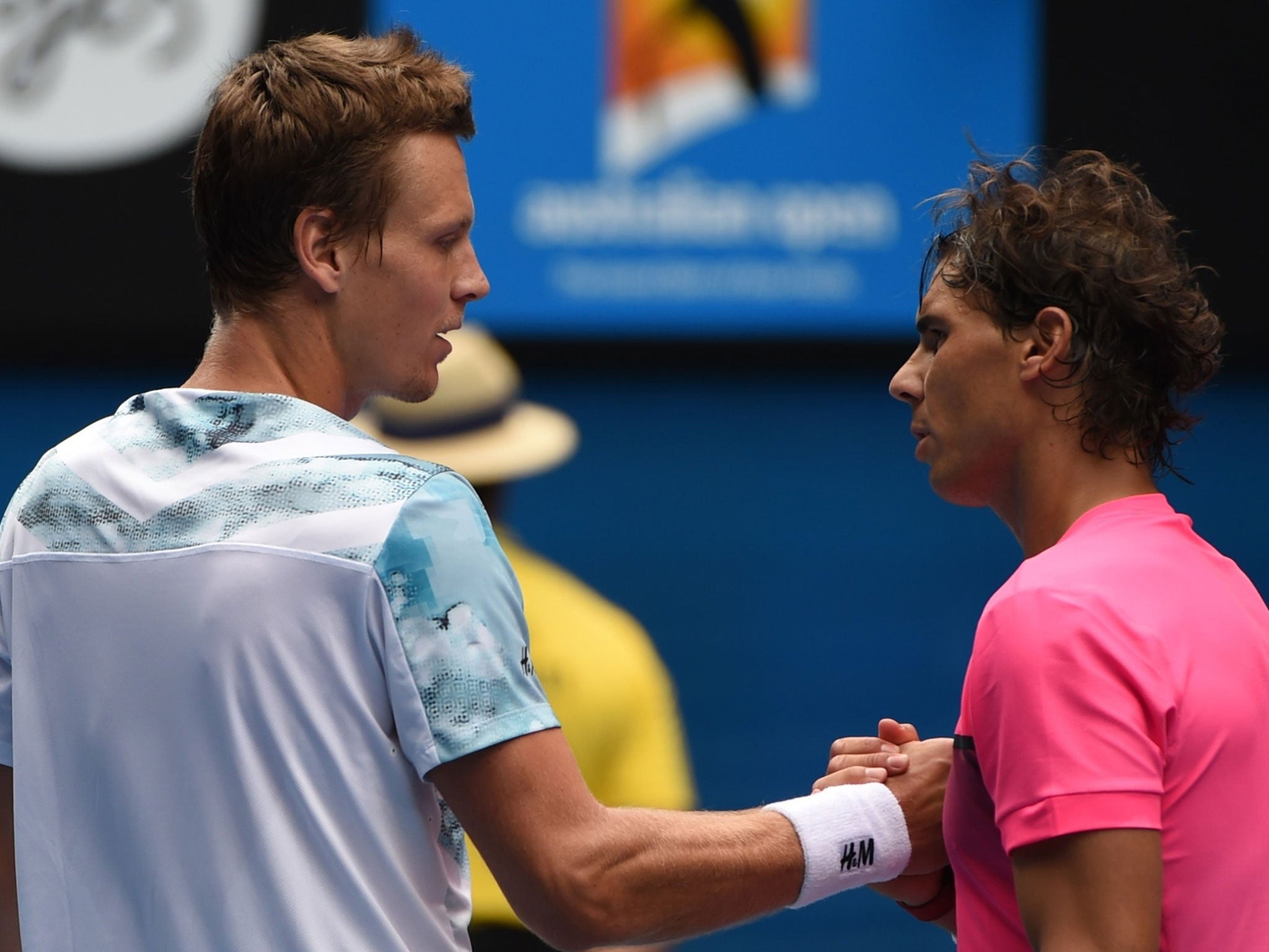 Tomas Berdych shakes hands with Rafael Nadal after knocking the Spaniard out of the Australian Open