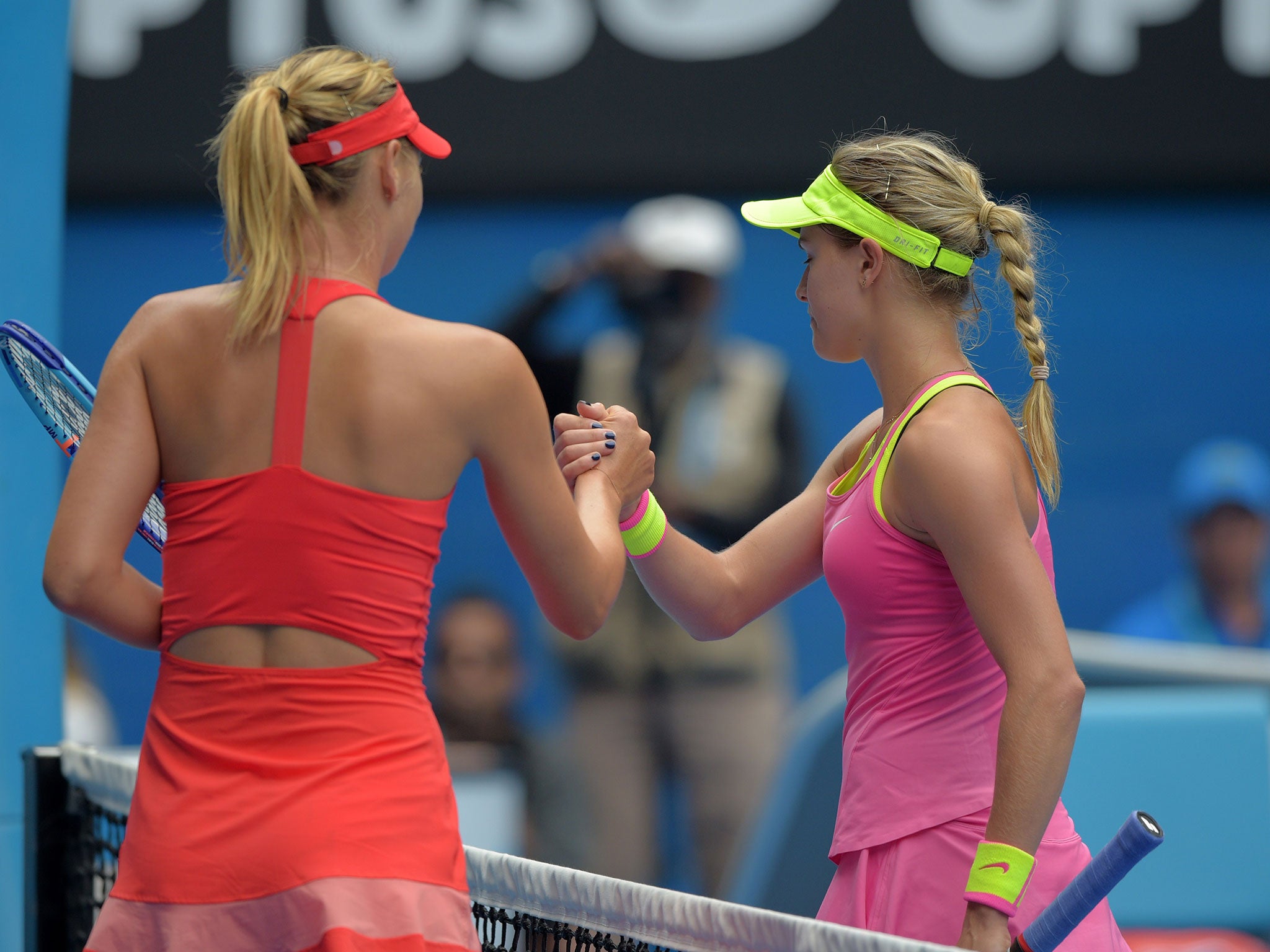 Sharapova and Bouchard shake hands after their quarter-final clash