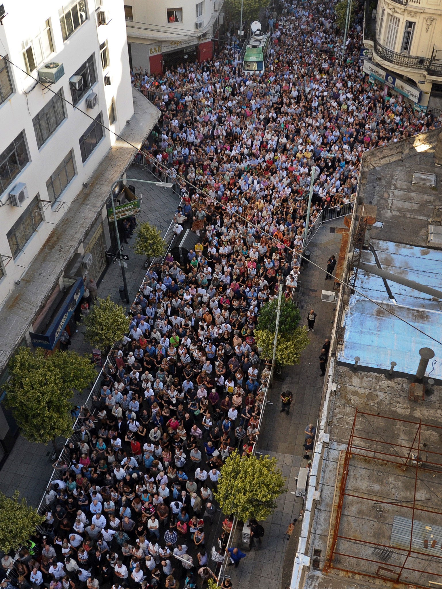 People rally in front of the headquarters of the AMIA, which was bombed in 1994, to protest against the death of Argentine public prosecutor Alberto Nisman