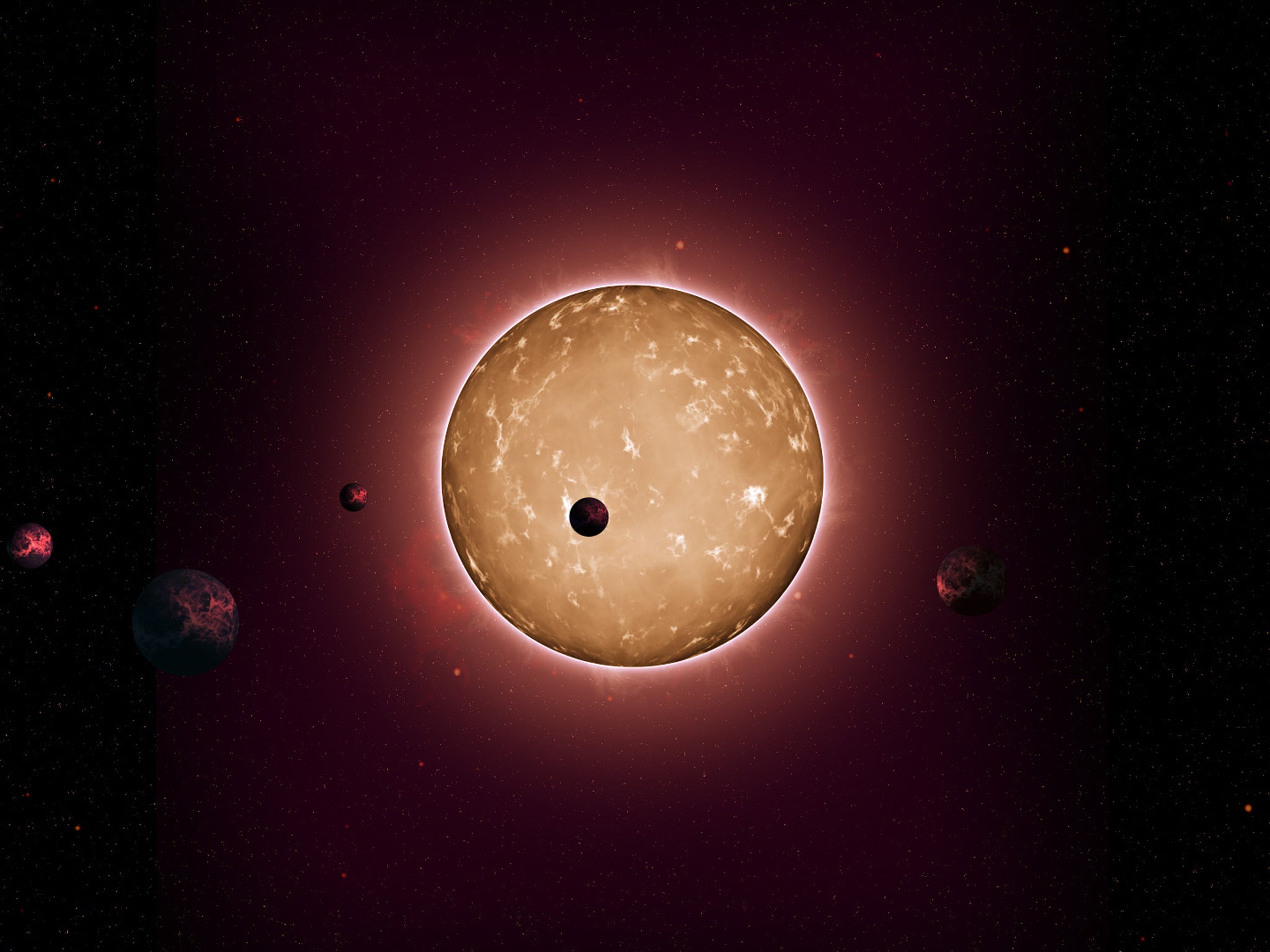 Kepler-444 hosts five Earth-sized planets in very compact orbits. The planets were detected from the dimming that occurs when they transit the disc of their parent star, as shown in this artist's conception.