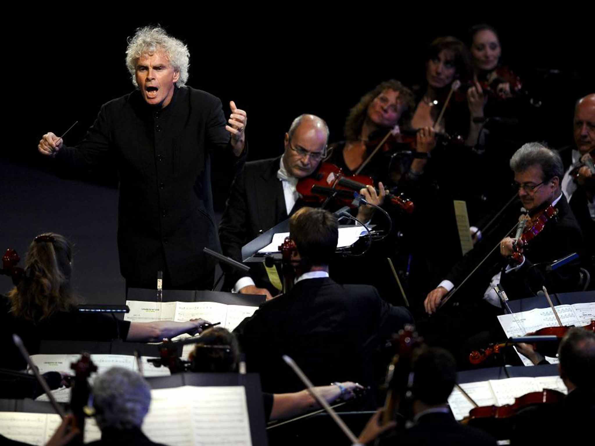 Baton charge: Simon Rattle conducting the LSO in 2012