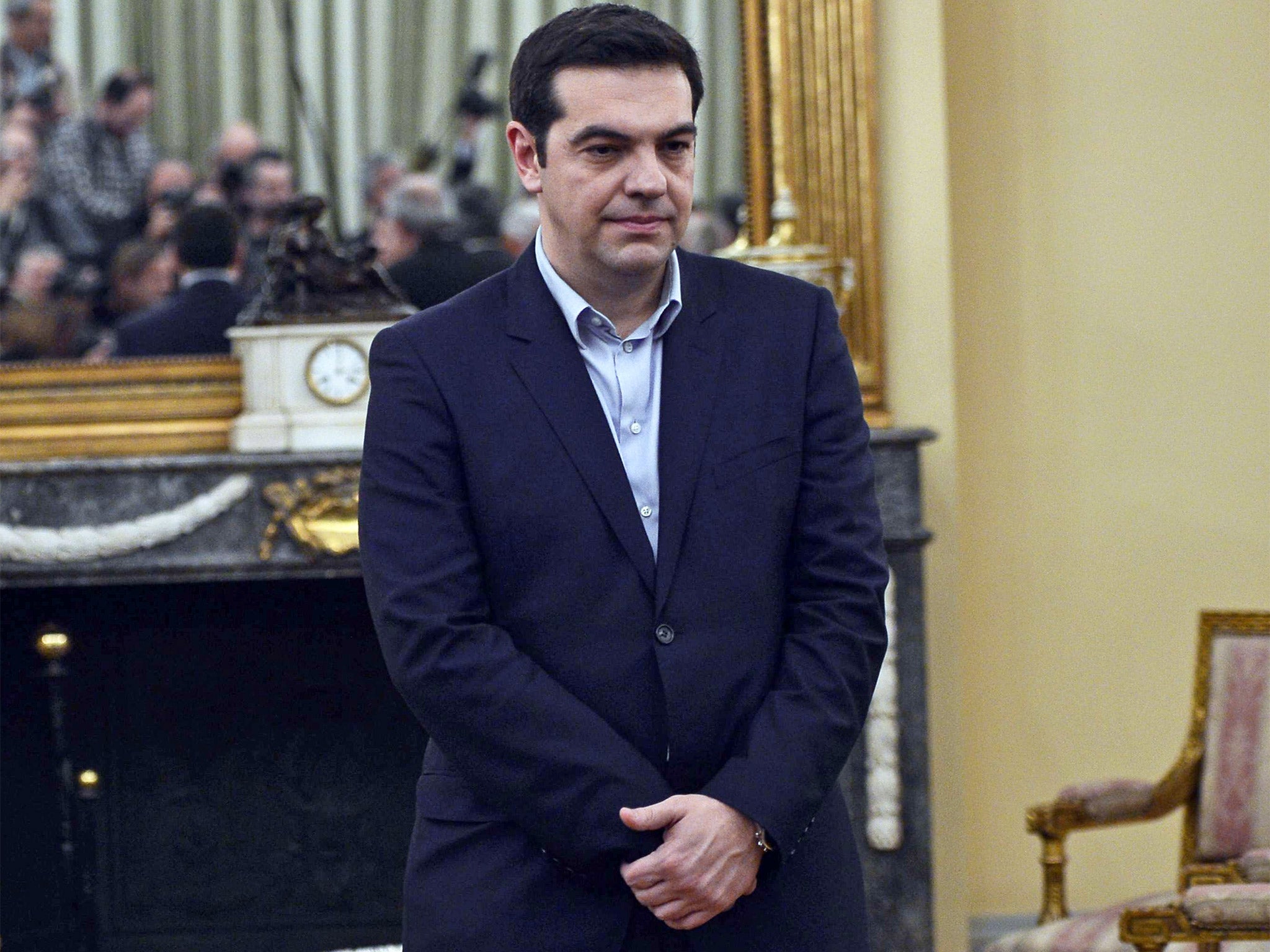 Newly elected Greek Prime Minister Alexis Tsipras was sworn in during a ceremony at the Presidental Palace in Athens on Tuesday