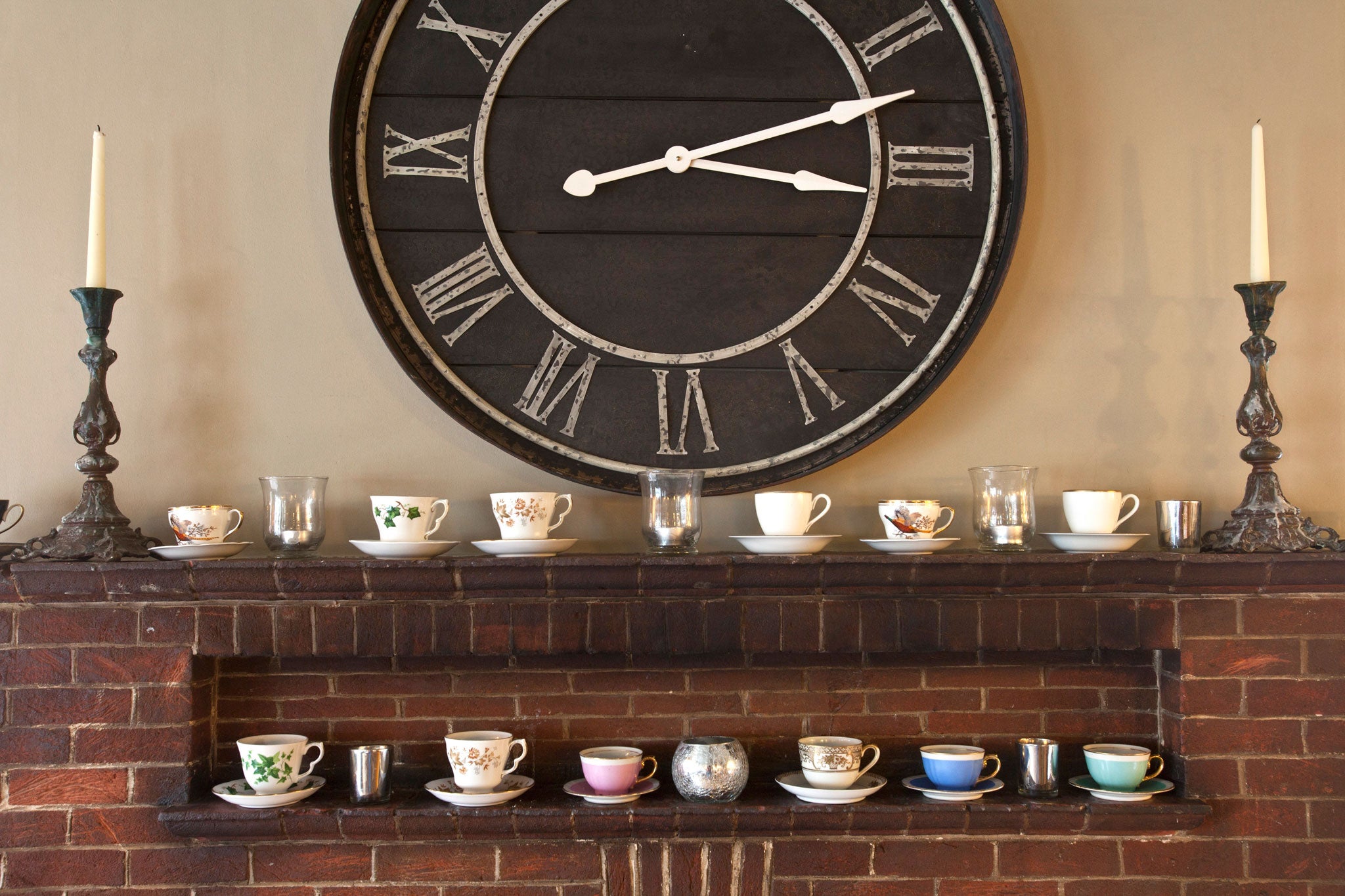 Fabulously timeless: The main design statements include a huge modern clock set amid a sea of brickwork