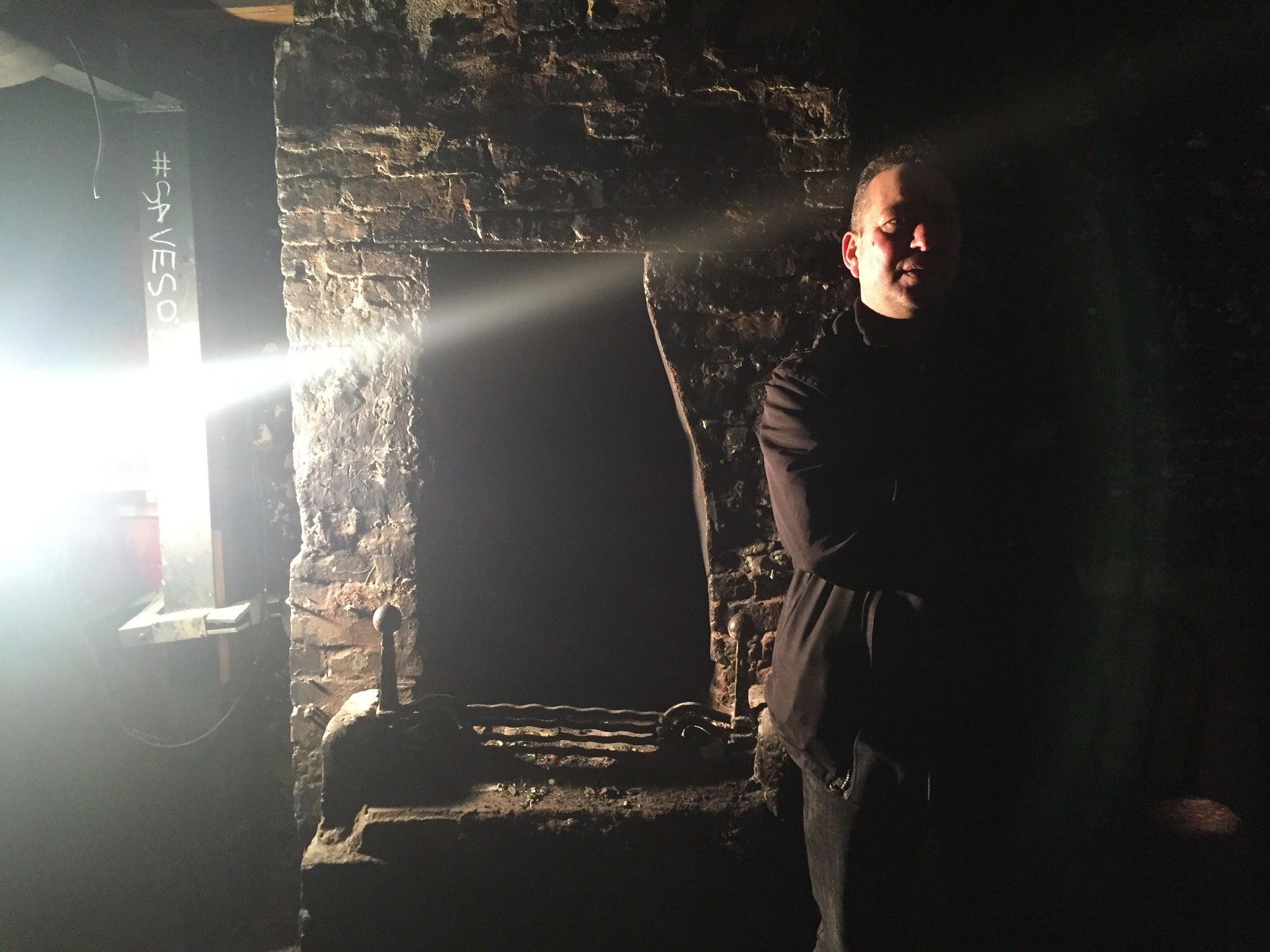 Former 12 Bar manager Mark with the forge dating back to the buildings time as a blacksmith's, which developers allegedly said they "wouldn't be upset" about if it collapsed