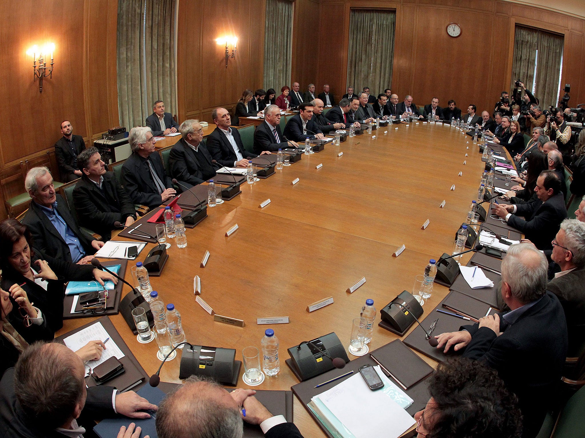 Greek Prime Minister Alexis Tsipras chairs the first cabinet meeting of the government in the Parliament, in Athens, Greece, on 28 January 2015