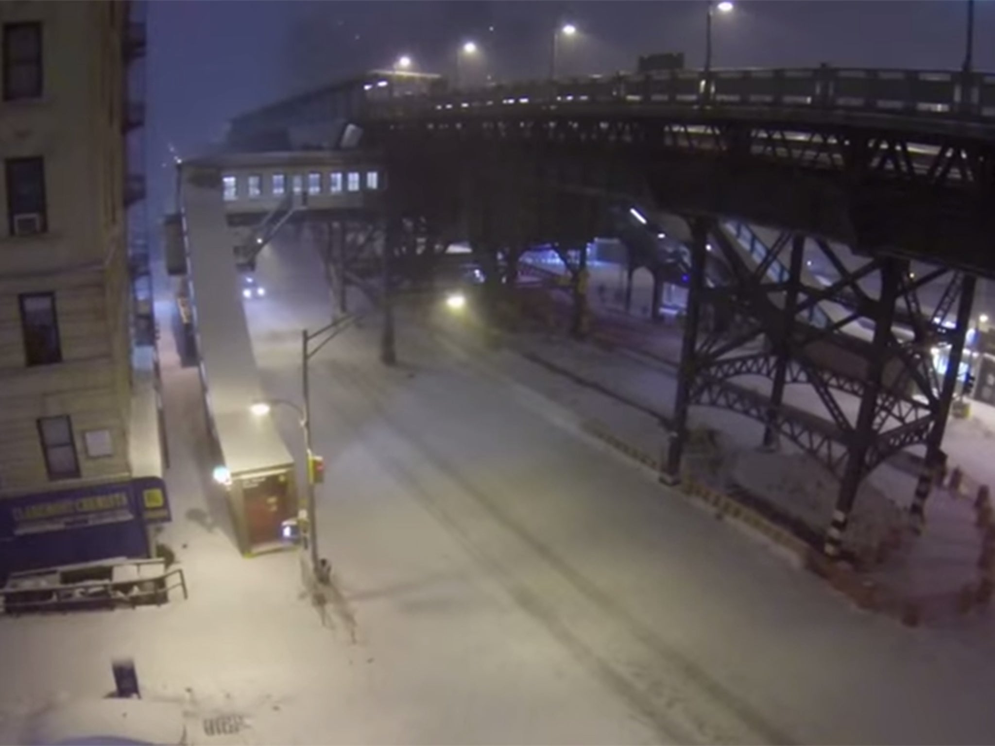 The city seems ghost-like as people stay indoors and out of the icy weather