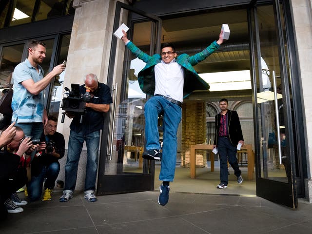 How do you like them Apples?: a happy customer celebrates after being the first person to purchase the iPhone 6 in London, last September