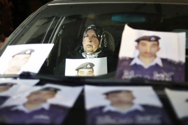 The mother of Jordanian pilot Muath al-Kasaesbeh at a demonstration in Amman, when the Jordanian government was urged to negotiate with Isis for the release of her son