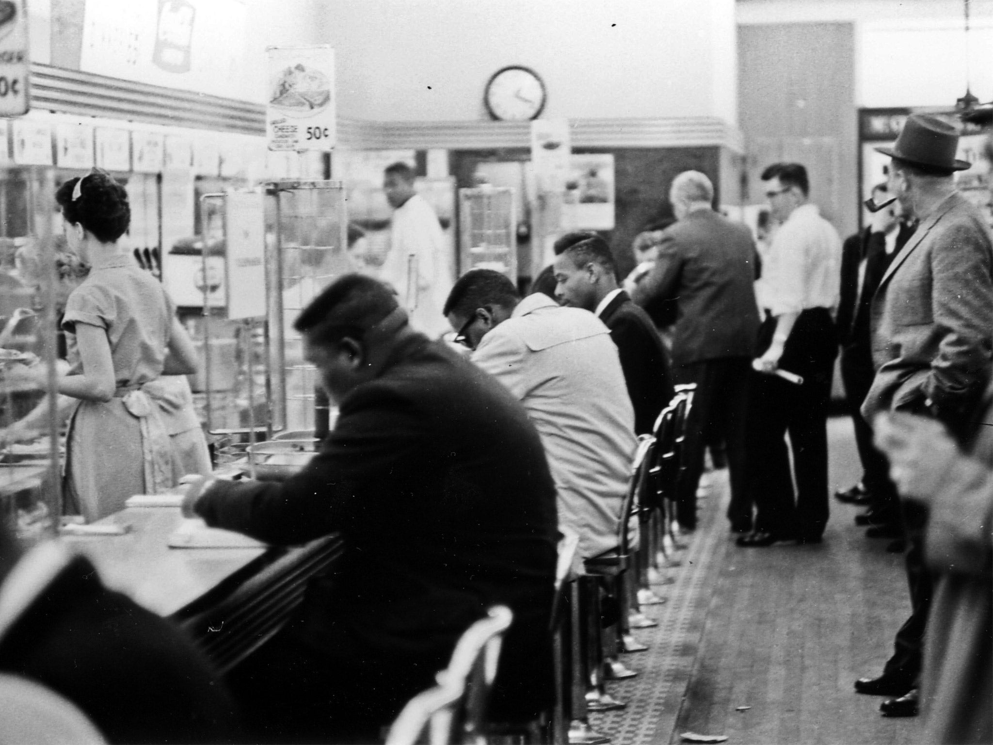 People take part in a civil rights 'sit-in' protest at the lunch counter at McCrory's in 1960. Eight Friendship Junior College students and a civil rights organizer were convicted of trespassing and breach of peace for staging a similar protest at the same lunch counter in 1961