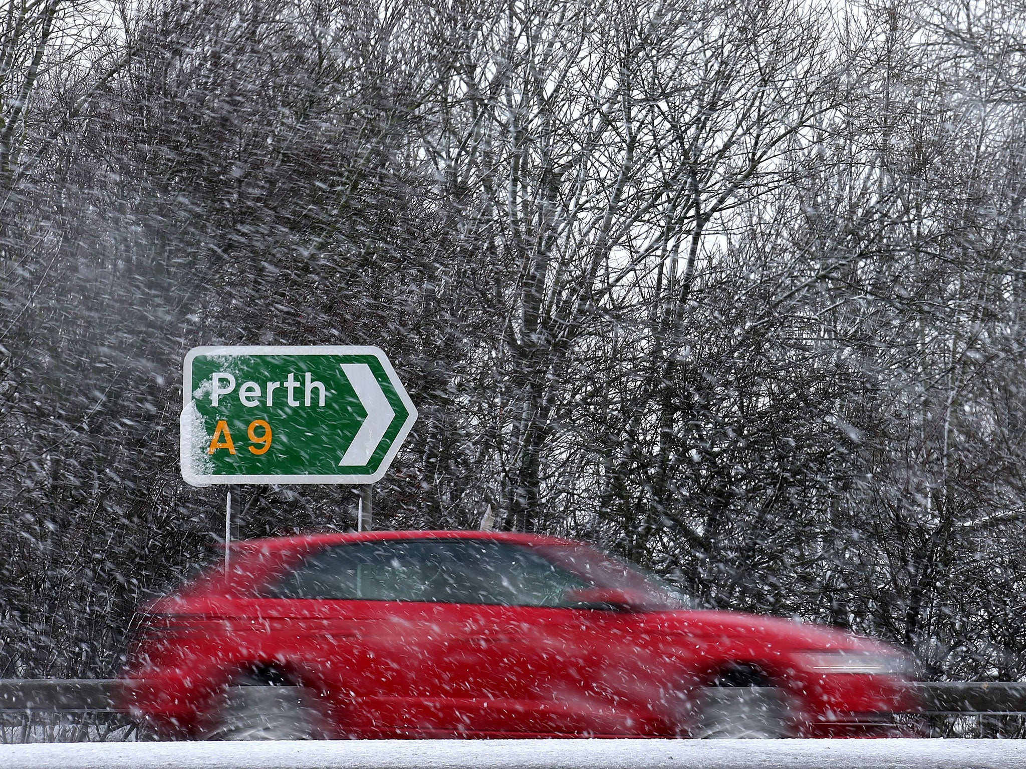 Snow Blizzards on the A9 road near Blackford, Perthshire as snow blizzards sweep across the country