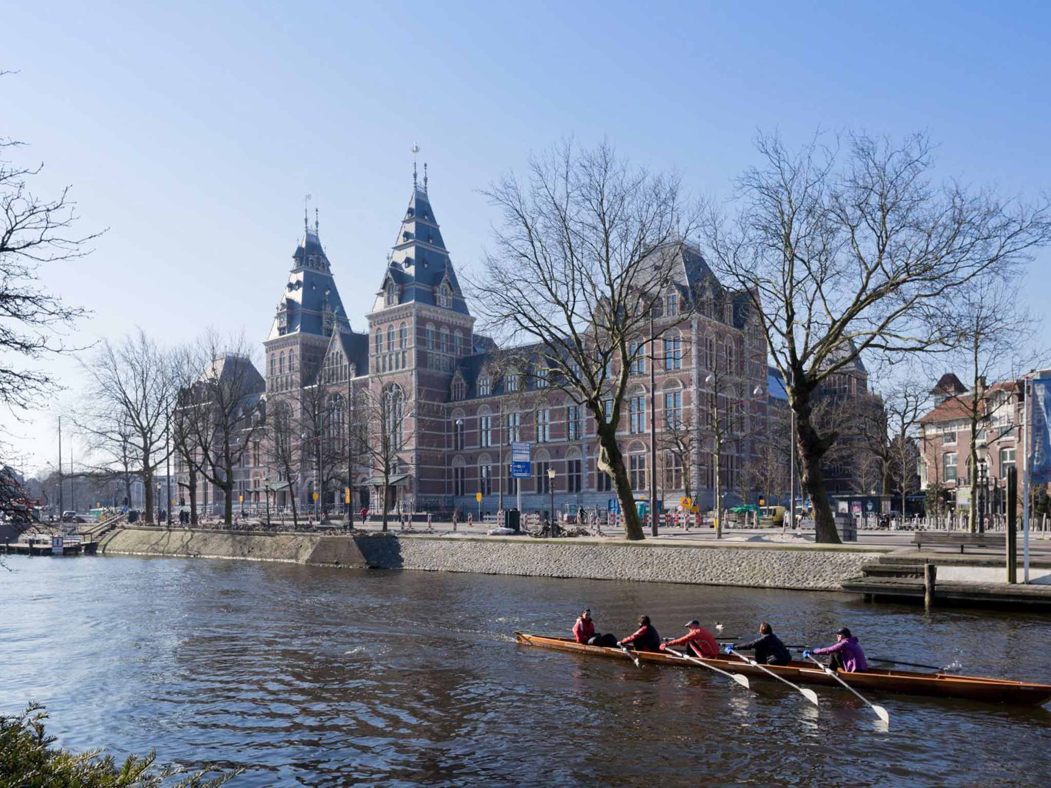 The best way to revive yourself after the long overnight flight is a coffee at the Café Papeneiland, 10 minutes' walk from Amsterdam Centraal station, followed by a visit to the superbly refreshed Rijksmuseum