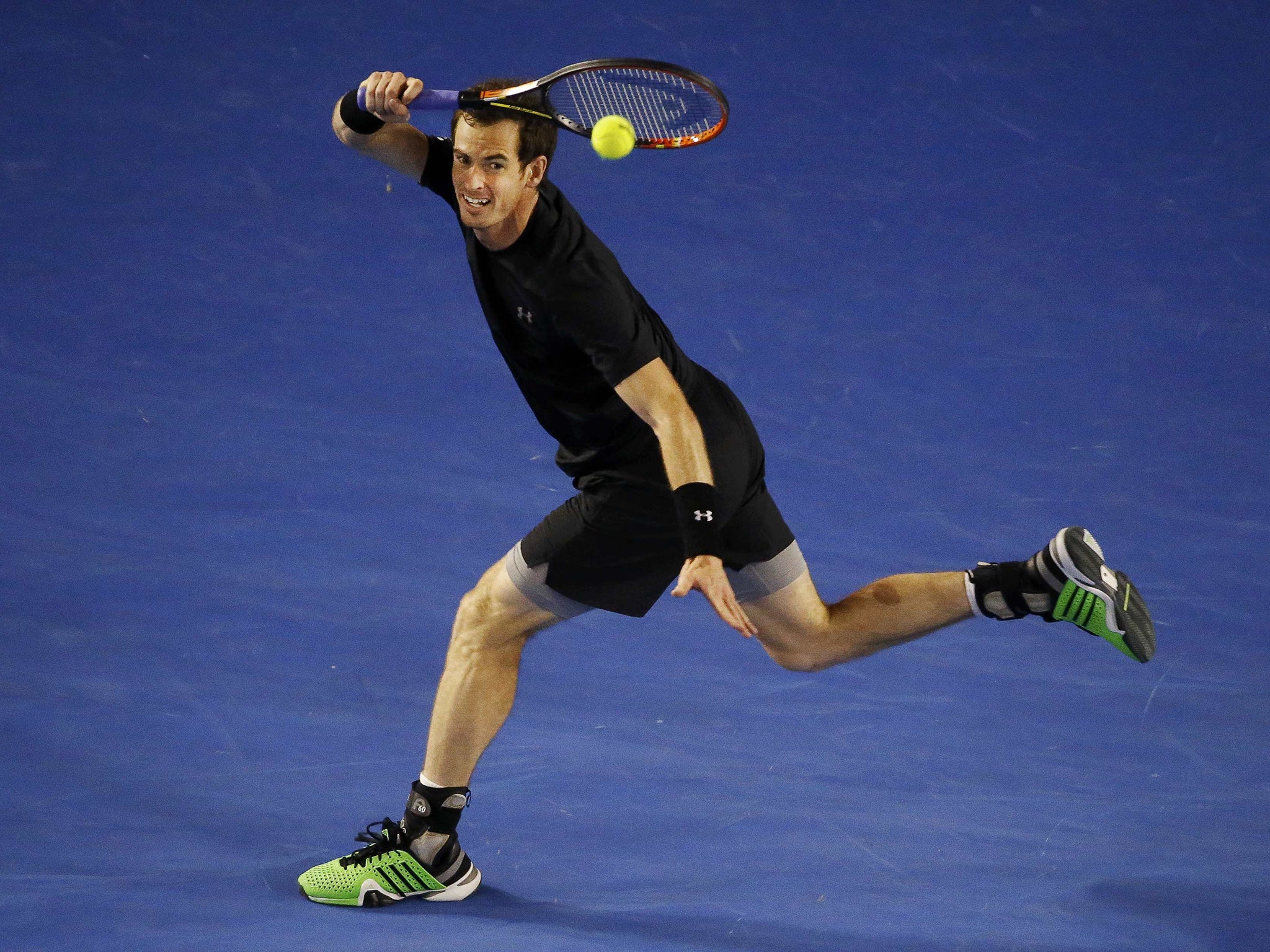 Andy Murray unleashes a forehand during his impressive victory over Tomas Berdych in Melbourne yesterday