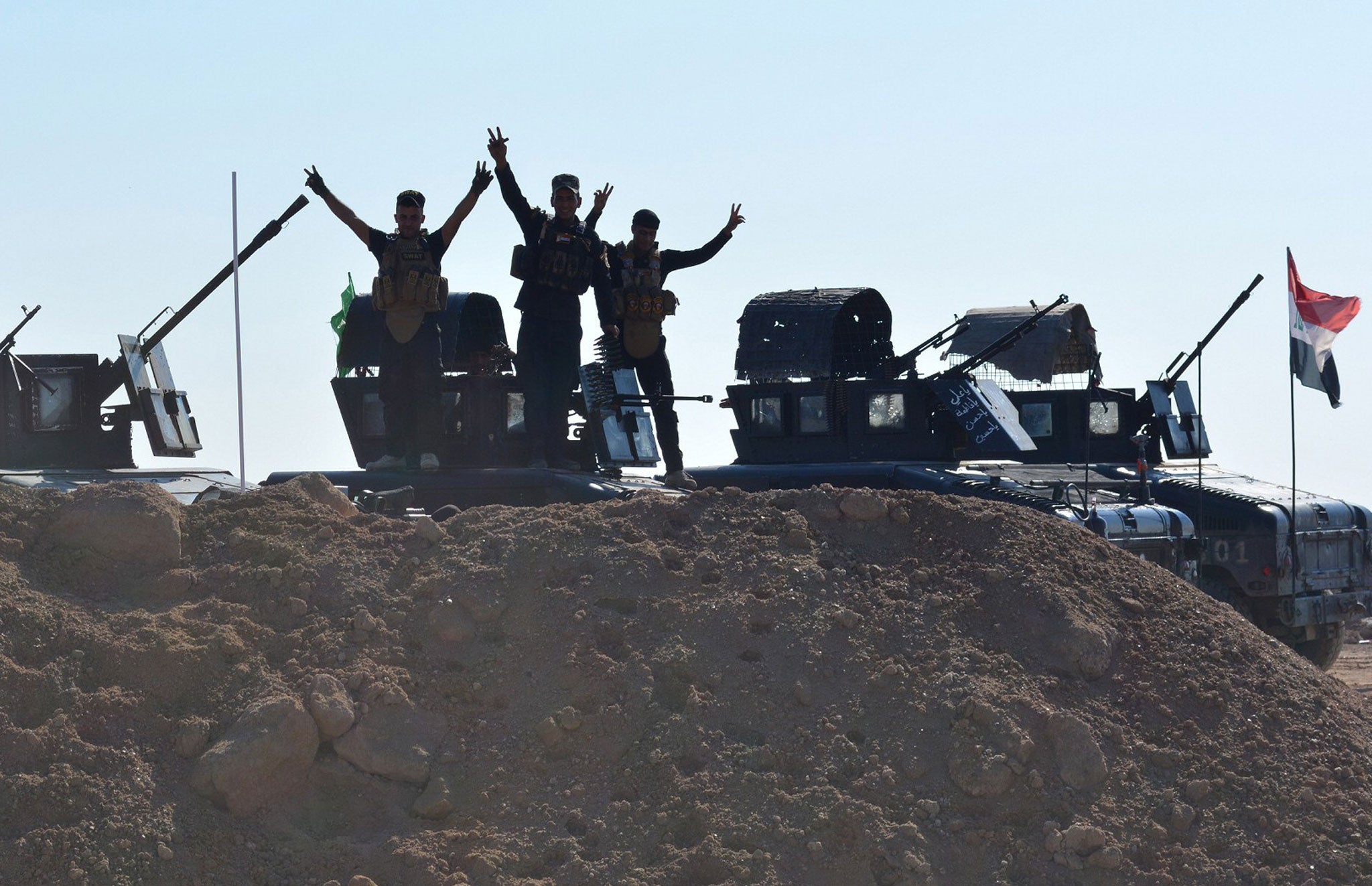 Iraqi pro-government forces take part in a major operation against Islamic State fighters to retake the areas around the Hamrin dam in November last year (Getty)