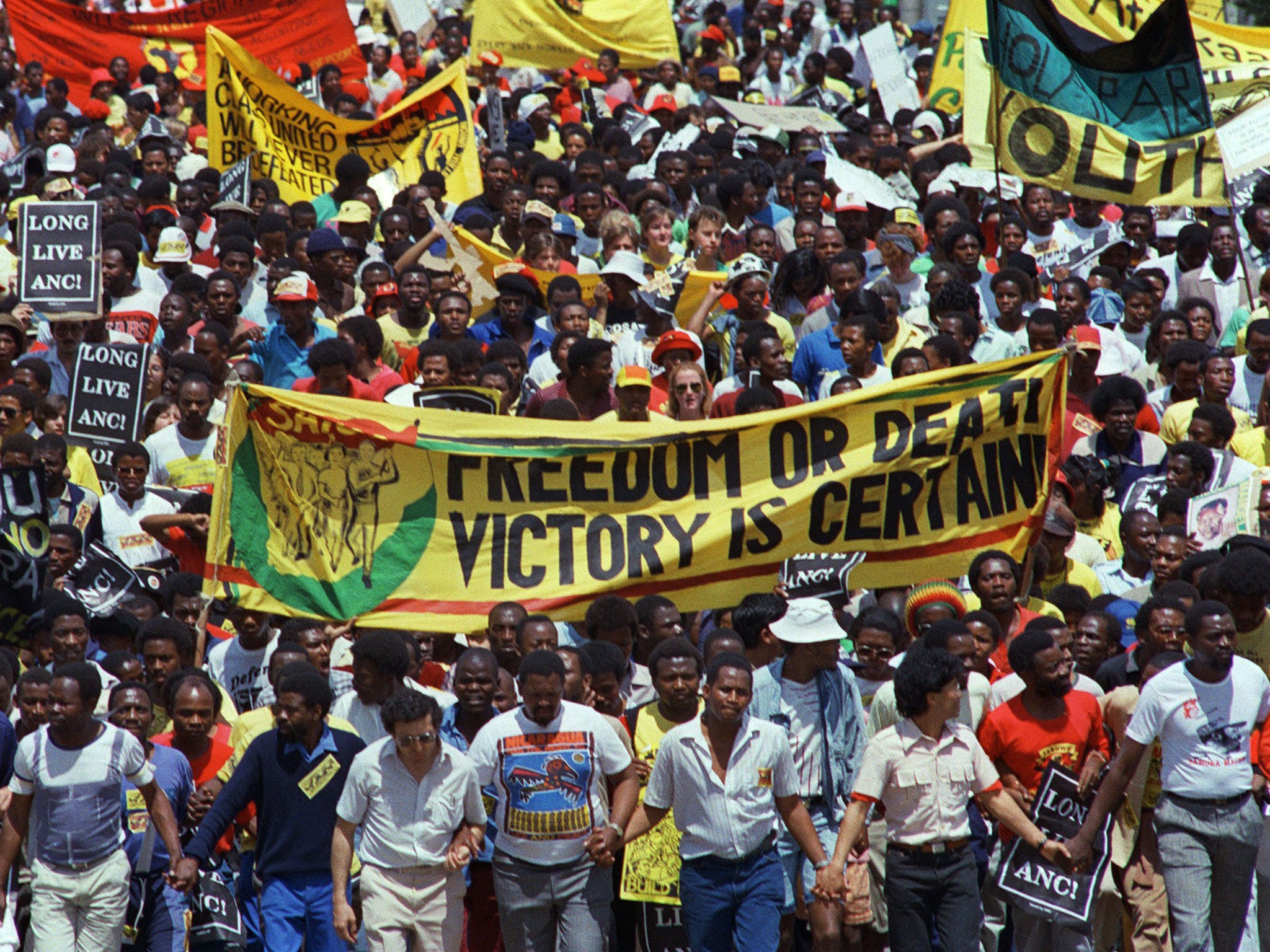 Demonstrators hold an anti-apartheid protest march through Johannesburg on 14 October 1989