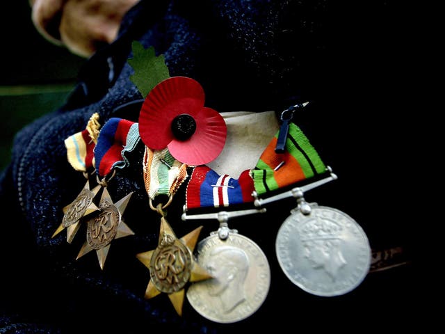 A military charity has warned of people pretending to be decorated veterans