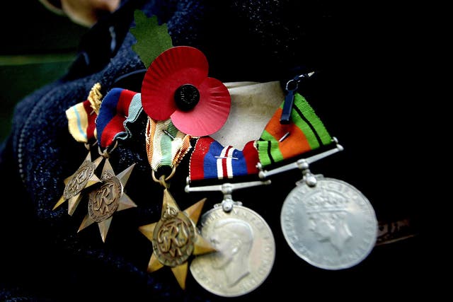 A military charity has warned of people pretending to be decorated veterans