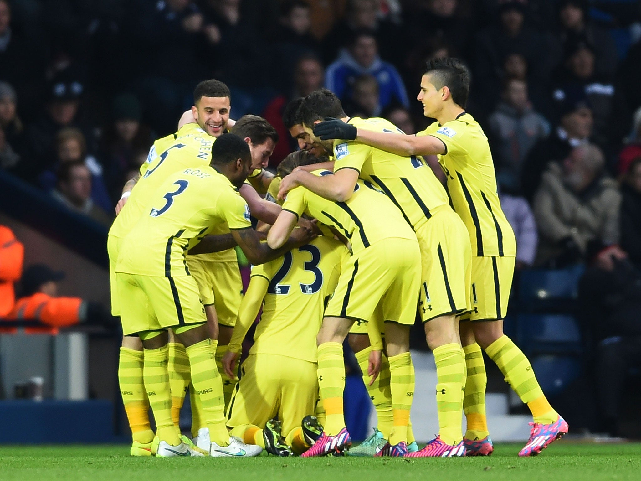 Spurs players swamp Christian Eriksen after he scores the opening goal