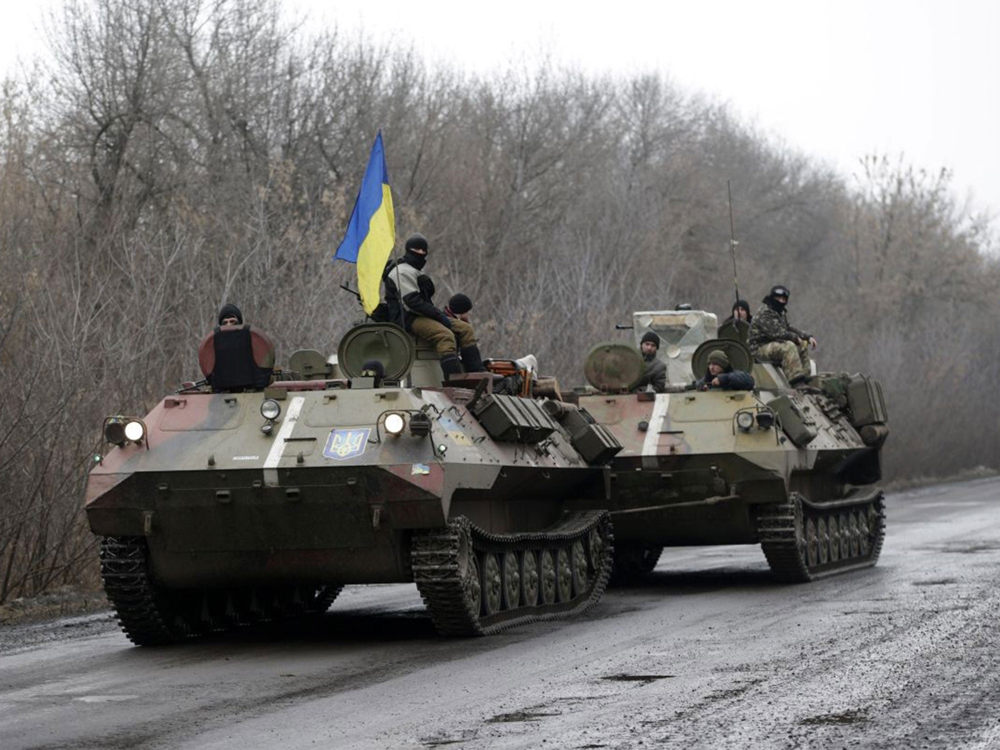 Ukrainian tanks travel towards the town of Artemivsk, near Donetsk, on 30 January, 2015.