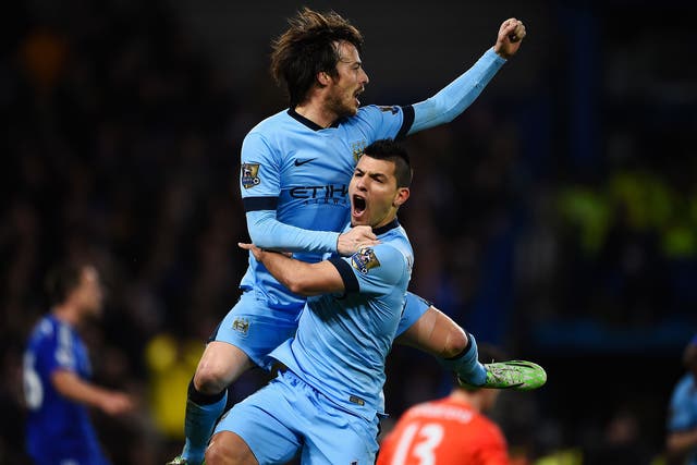 David Silva celebrates with Sergio Aguero after equalising against Chelsea