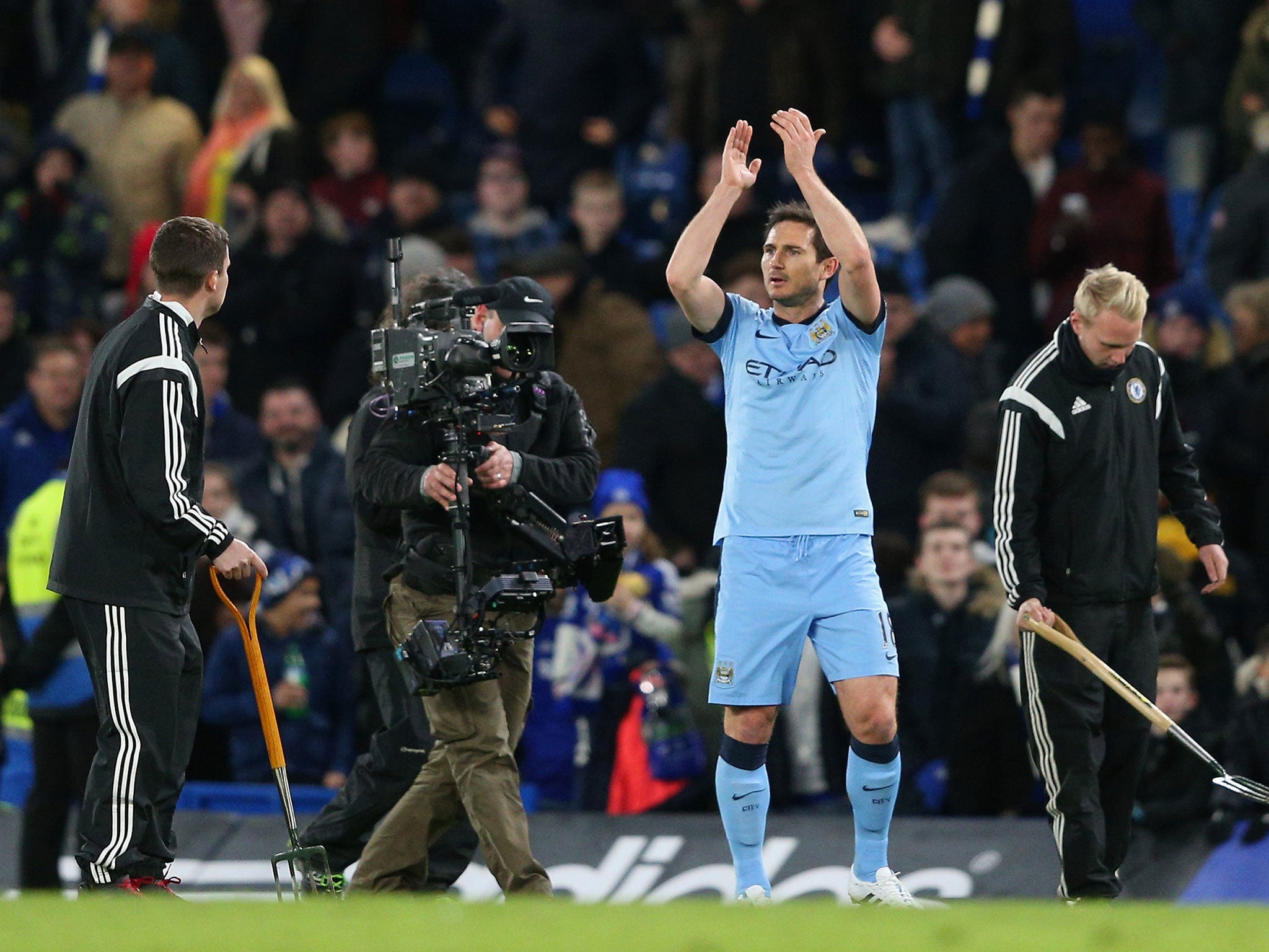 Frank Lampard applauds the Chelsea fans as well as the Manchester City supporters