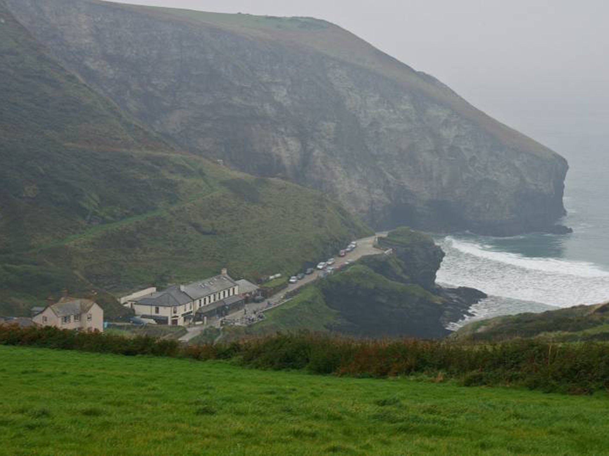 The man was caught by a large wave at Port William in Cornwall whilst spreading ashes