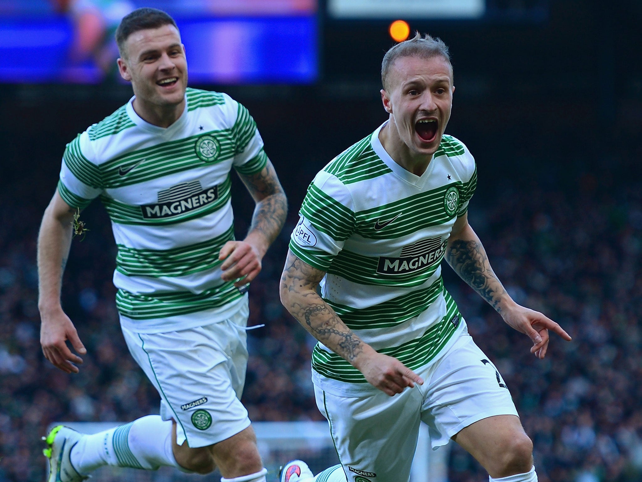 Leigh Griffiths (right) celebrates opening the scoring
