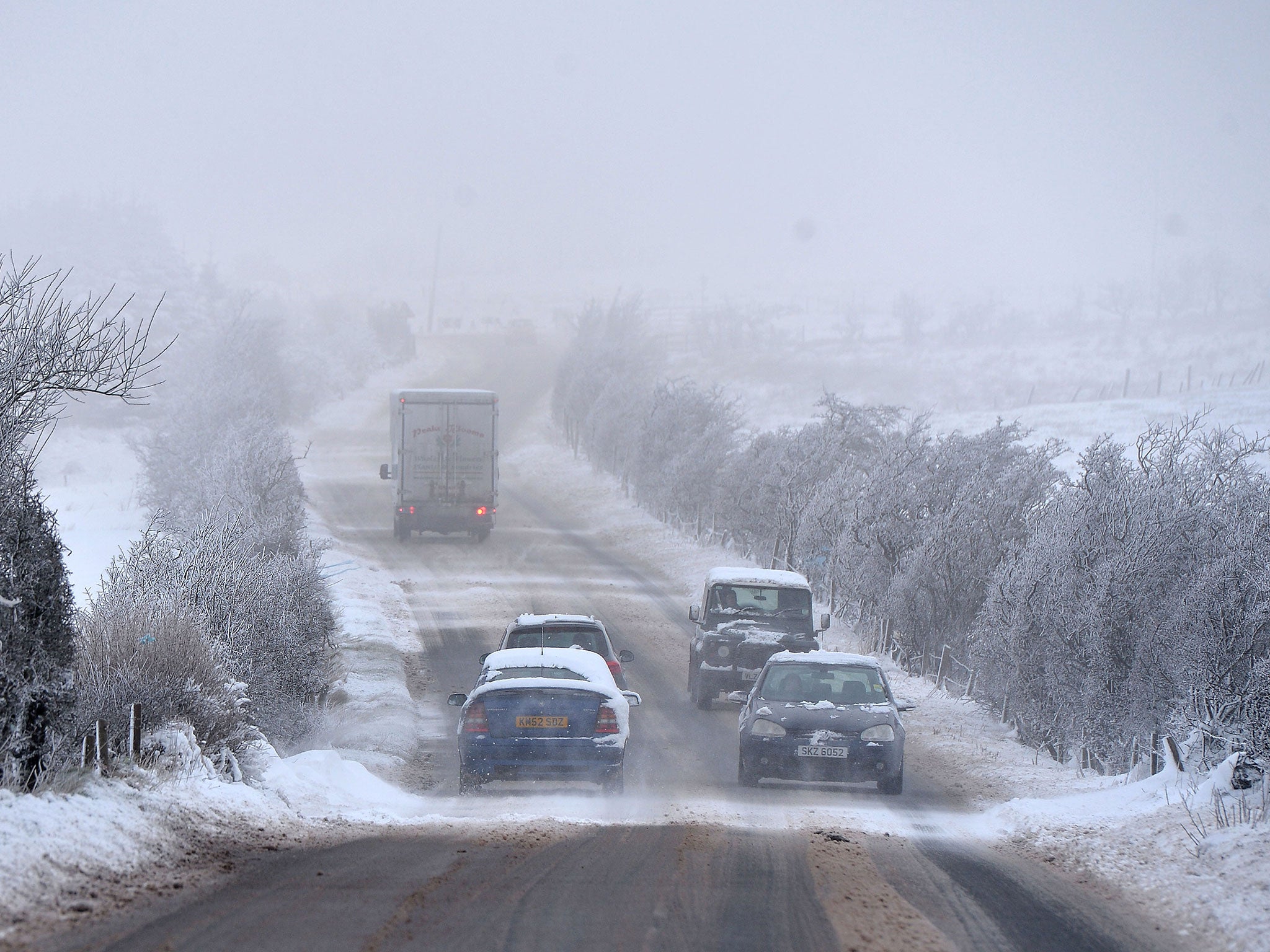 Motorists make their way over Hannahstown Hill Belfast