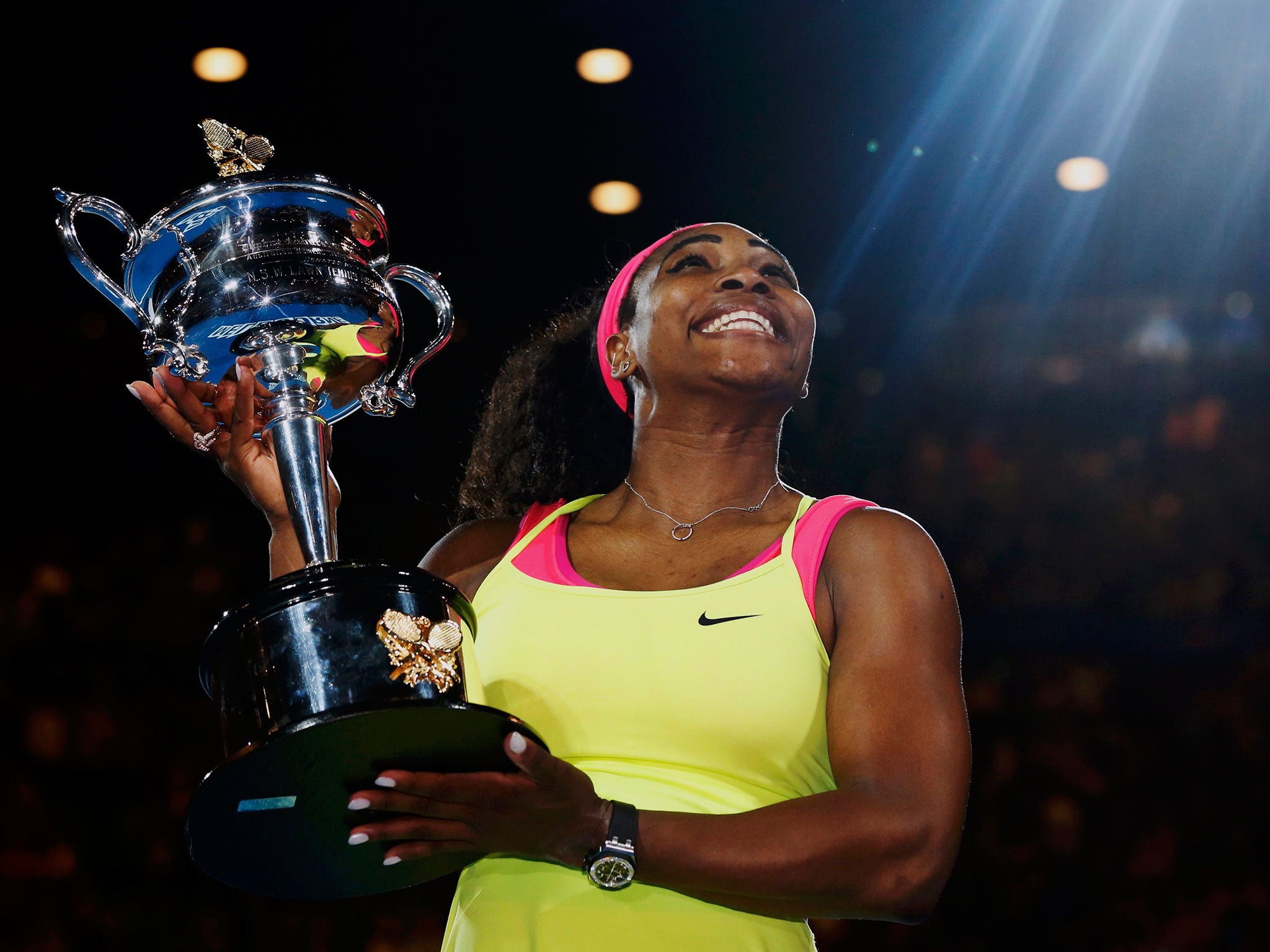 31 Janaury 2015: Serena Williams of the U.S. poses with her trophy after defeating Maria Sharapova of Russia in their women's singles final match at the Australian Open 2015 tennis tournament in Melbourne