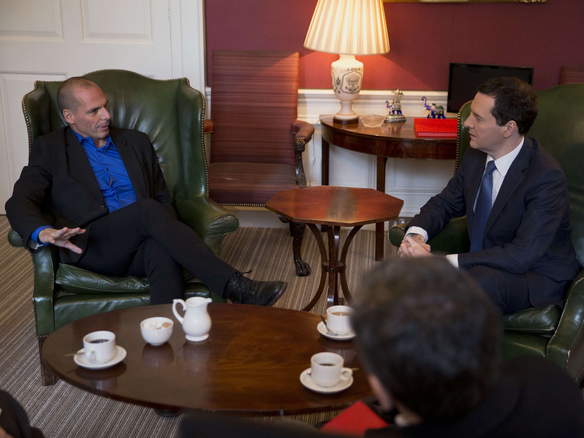 Greek Finance Minister Yanis Varoufakis (L) meets with Britain's Finance Minister George Osborne at 11 Downing Street in London on February 2, 2015.
