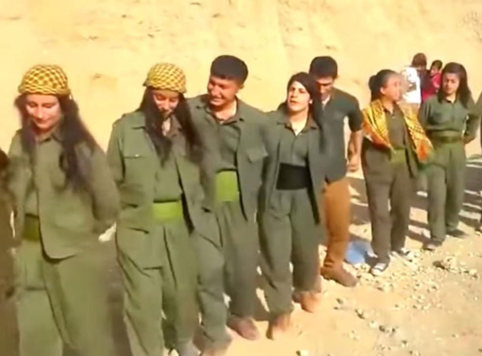 Kurdish fighters dancing through Kobani after driving Isis out of the city