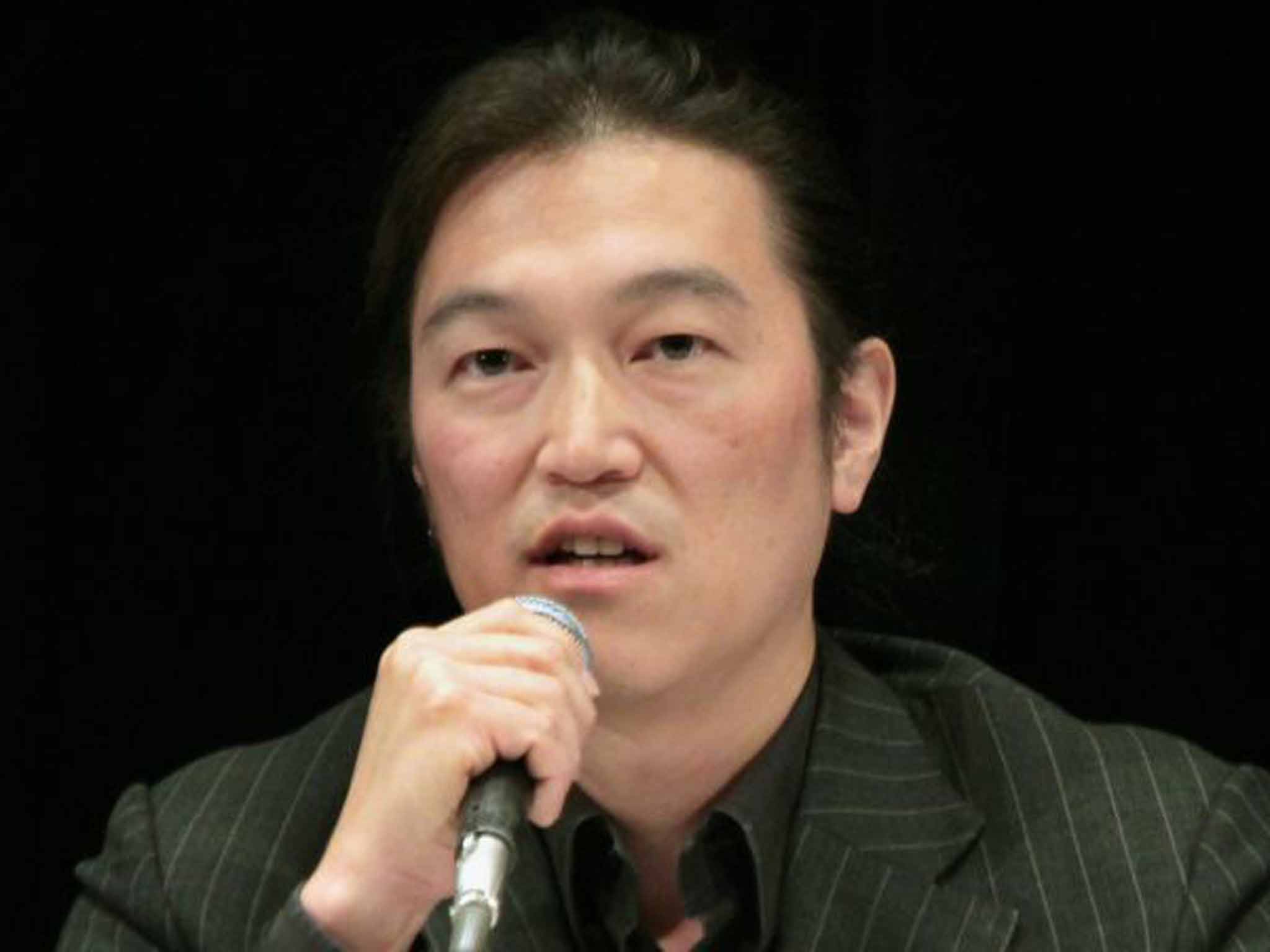 Goto delivers a lecture to a symposium in Tokyo in 2010: he directed attention to conflicts hitherto widely unregarded
in Japan