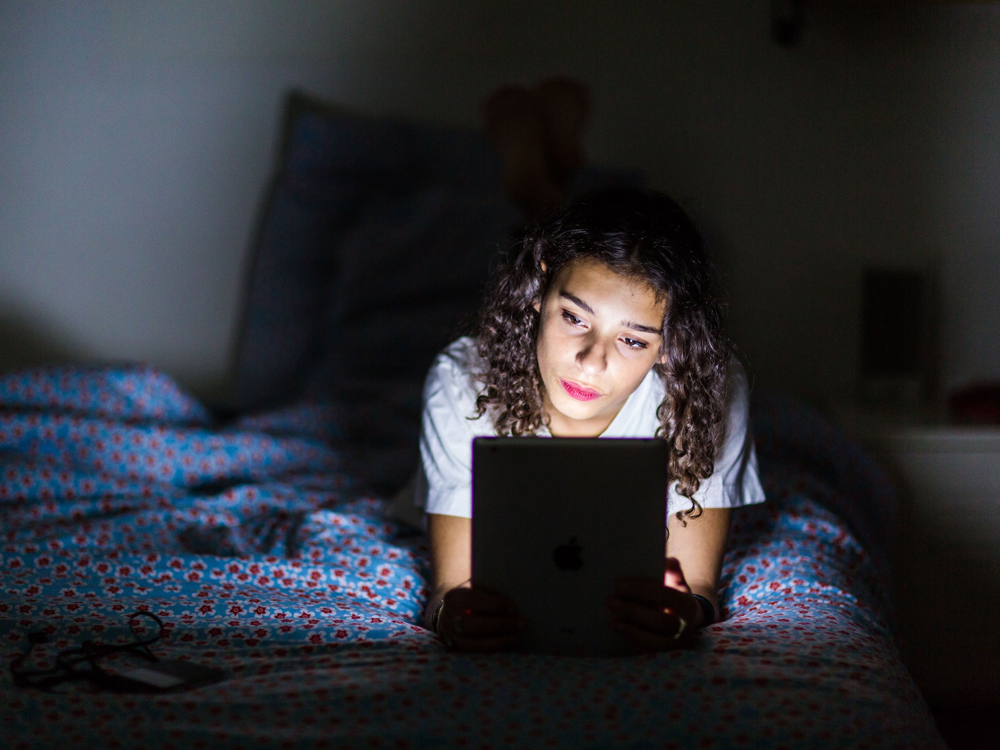The study found that teenagers who spend more than four hours a day looking at screens have a 49 per cent greater risk of taking longer than an hour to fall asleep (Rex)
