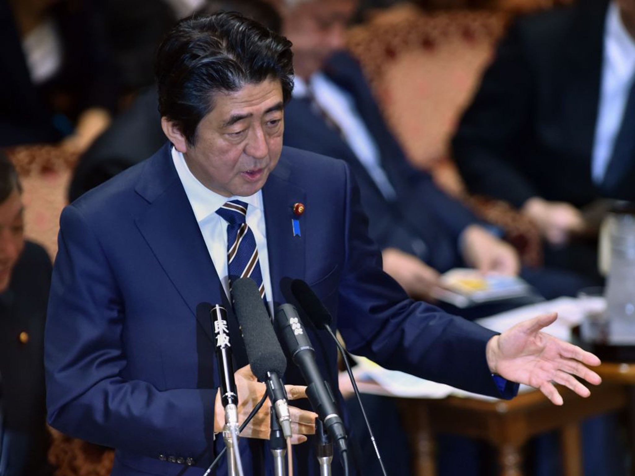 Japan's Prime Minister Shinzo Abe has announced $200m (£133m) in non-military aid for the fight against Isis (AFP)