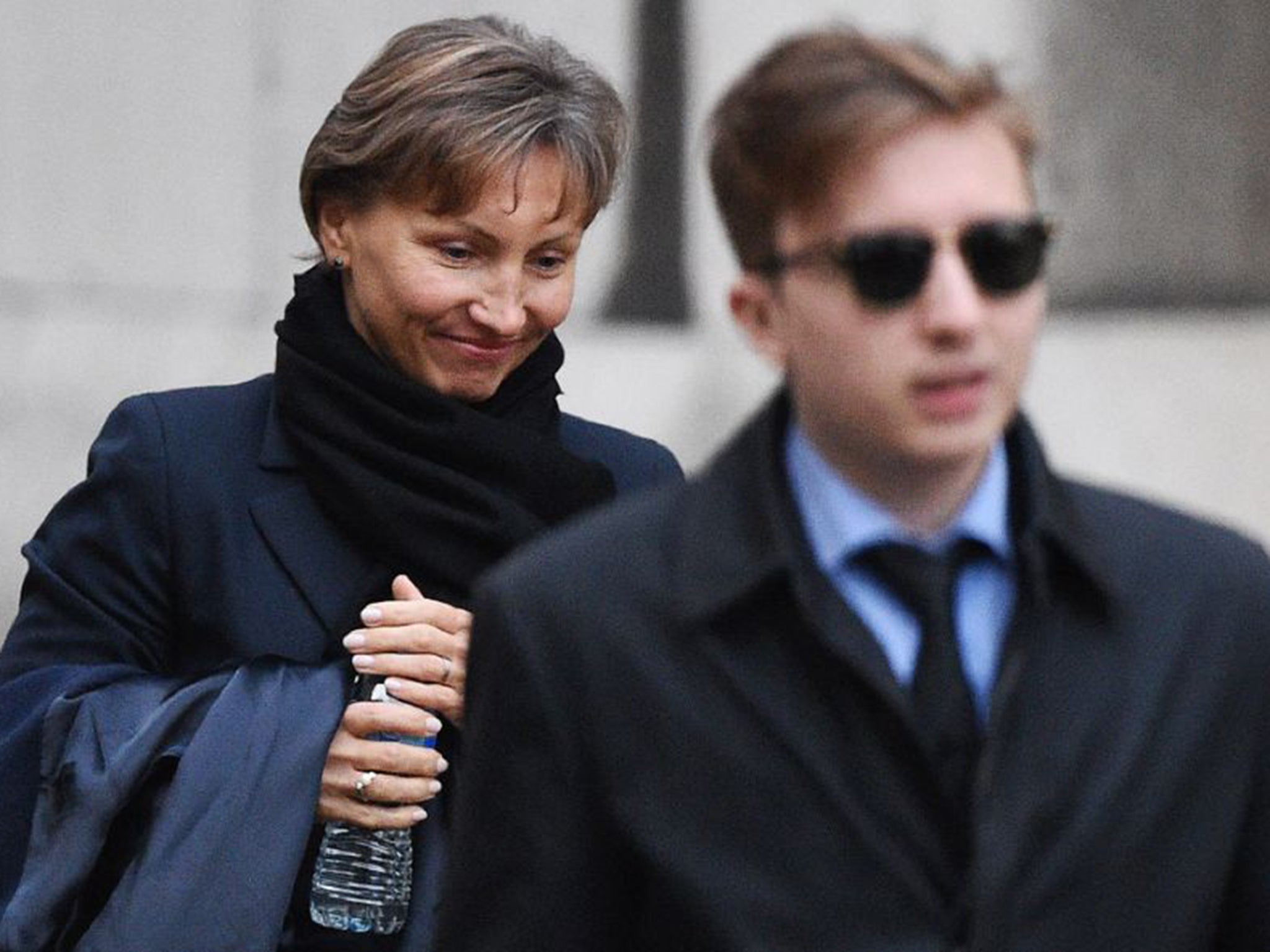 Alexander Litvinenko’s widow, Marina, and their son, Anatoly, leave the Royal Courts of Justice yesterday